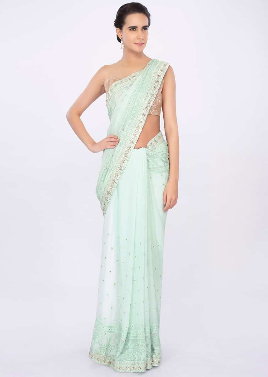 Sea green georgette saree in lucknowi embroidery only on kalki