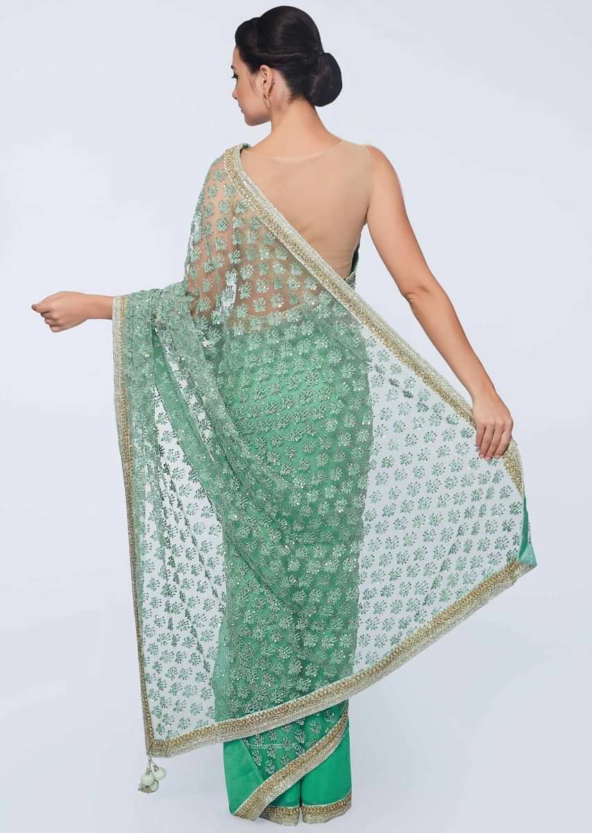 Sea green half and half saree featuring in net and chiffon