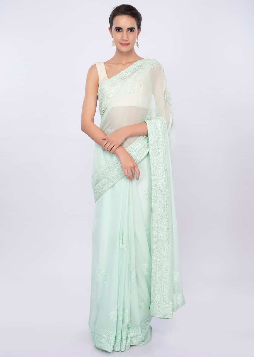 Sea green lucknowi embroidered georgette saree only on Kalki