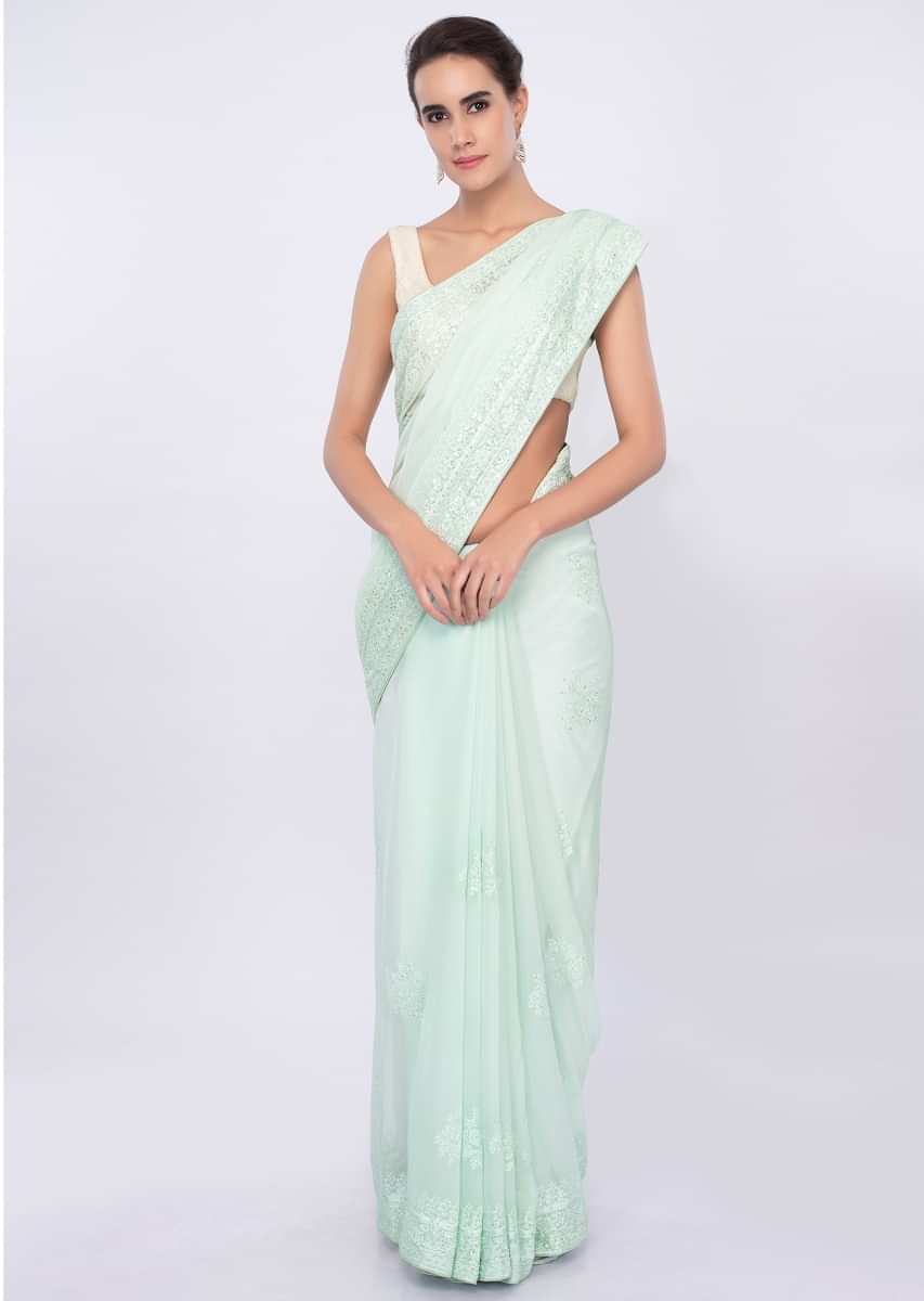 Sea green lucknowi embroidered georgette saree only on Kalki