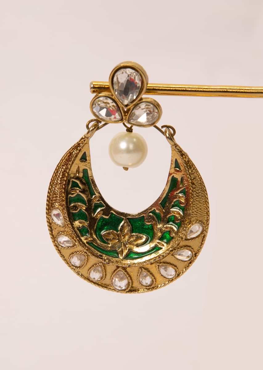 Self carved chandbali earring enhanced with kundan and  pearl