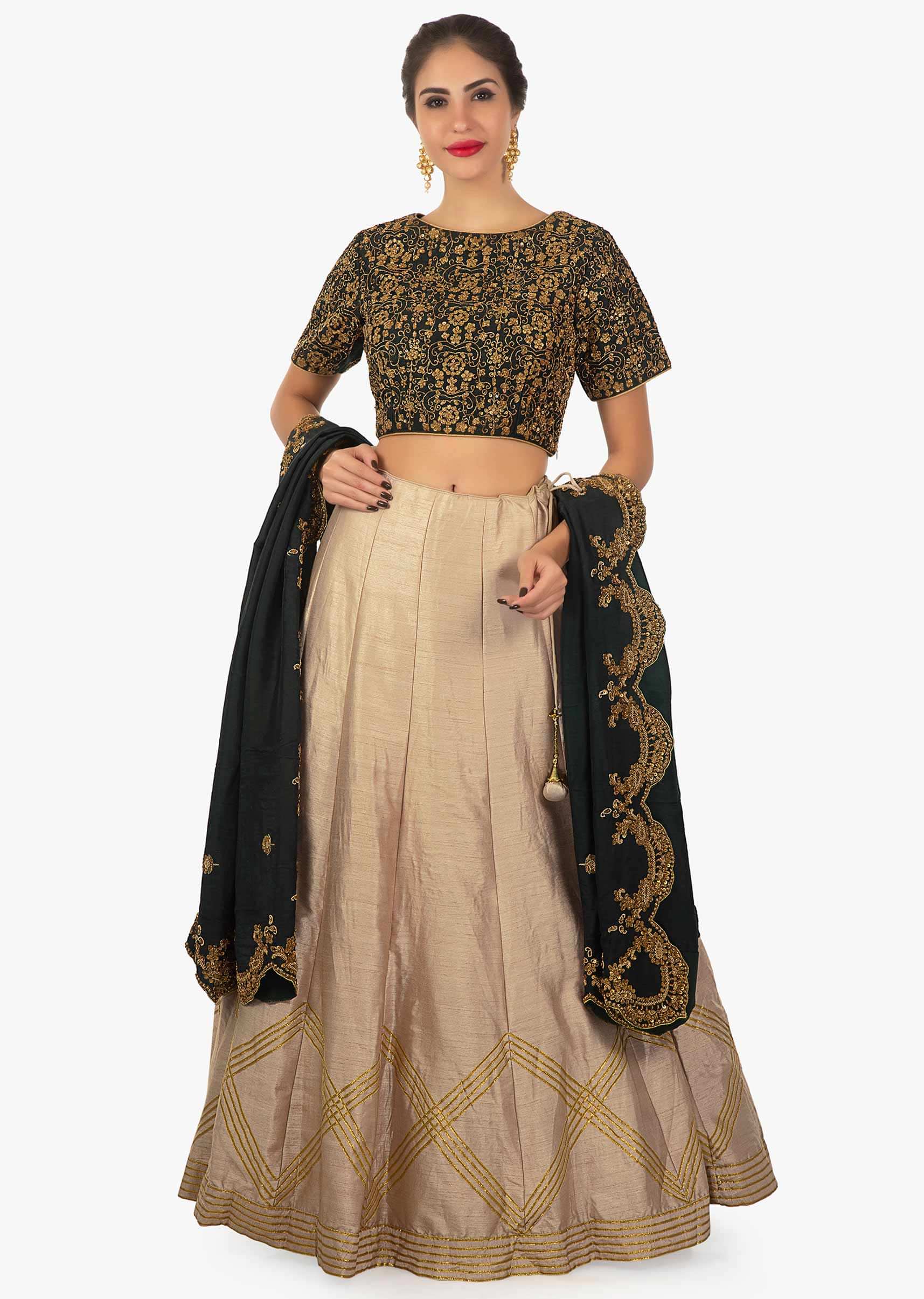Sepia brown raw silk lehenga in gotta lace paired with pine green blouse