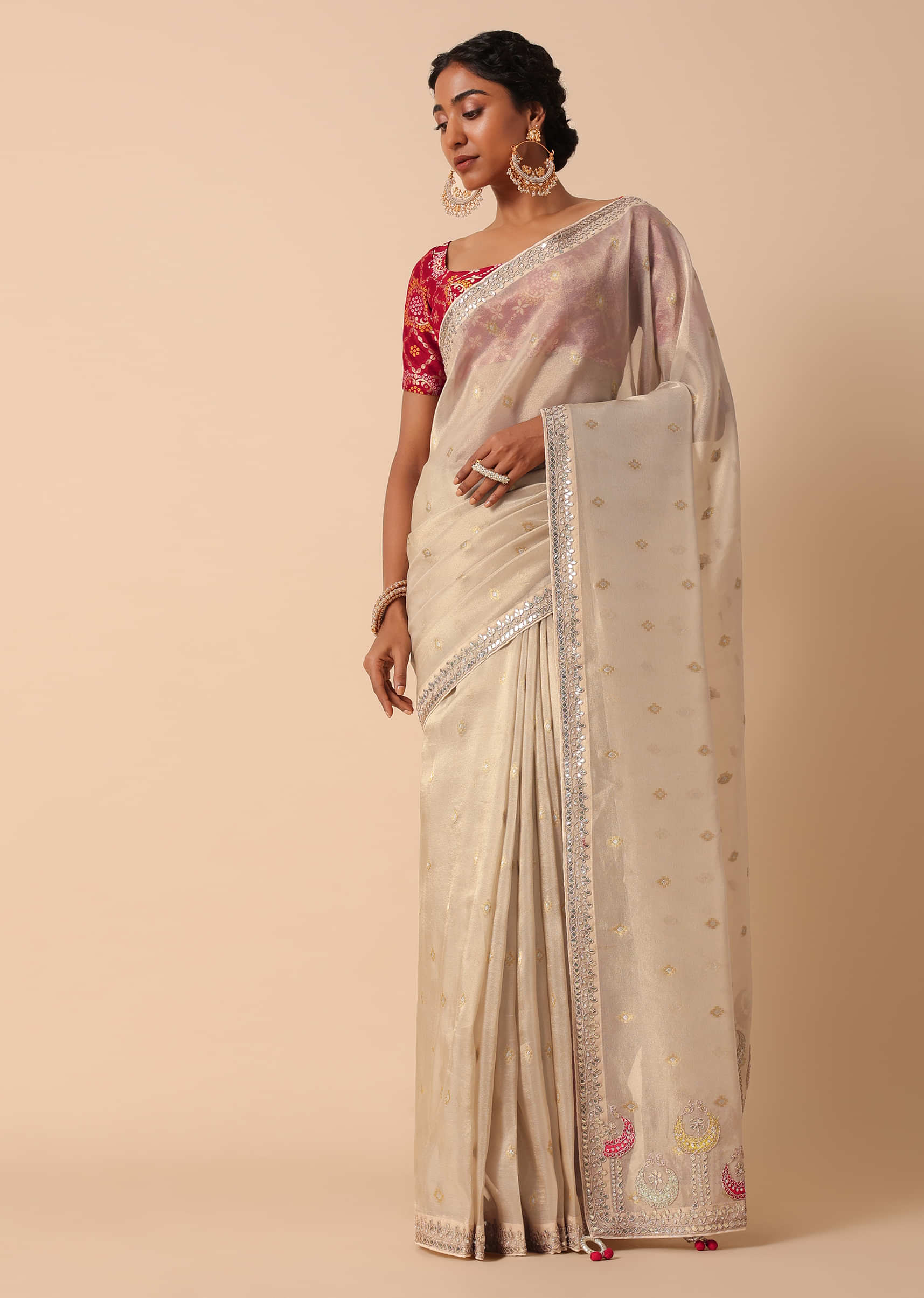 This pink Jamdani here is matched with this beige Saree Shapewear