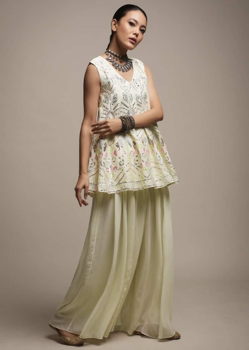 Off White Palazzo Suit In Georgette With A Flared Short Kurti Adorned In Resham And Sequins Embroidery  