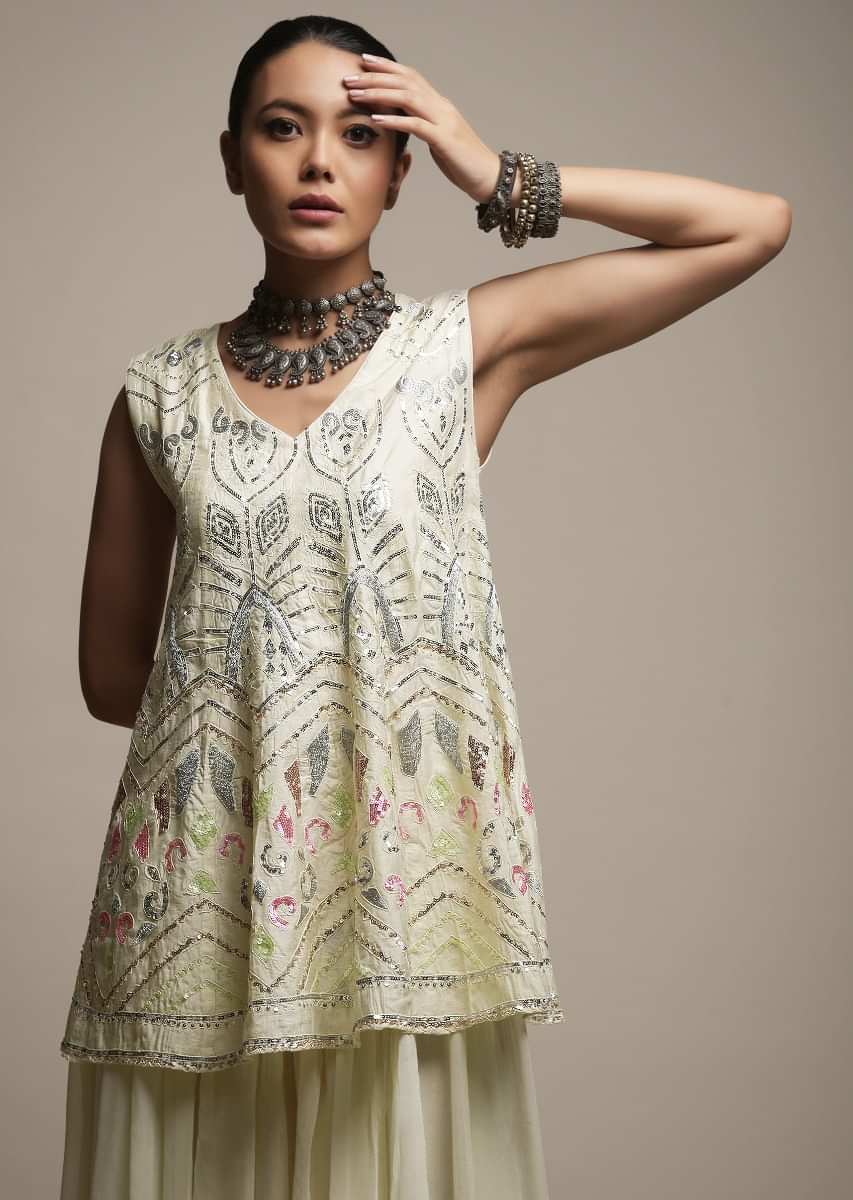 Off White Palazzo Suit In Georgette With A Flared Short Kurti Adorned In Resham And Sequins Embroidery  
