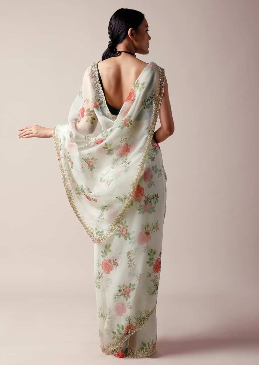 Off white Saree In Organza With Floral Print And Cut Dana Work Along With Unstitched Blouse  
