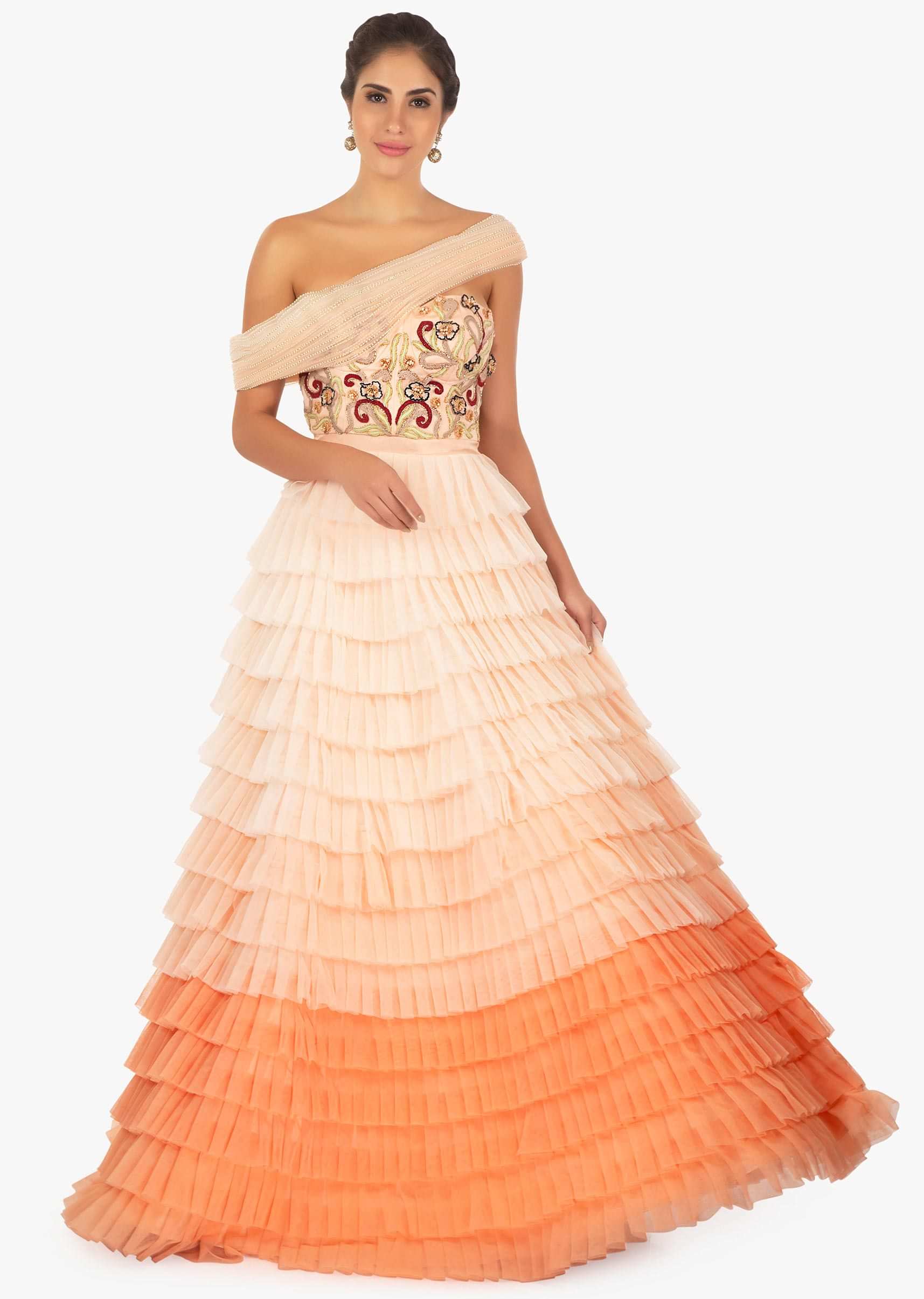 Shaded peach gown featuring in 3 D flowers and resham embroidery  only on Kalki
