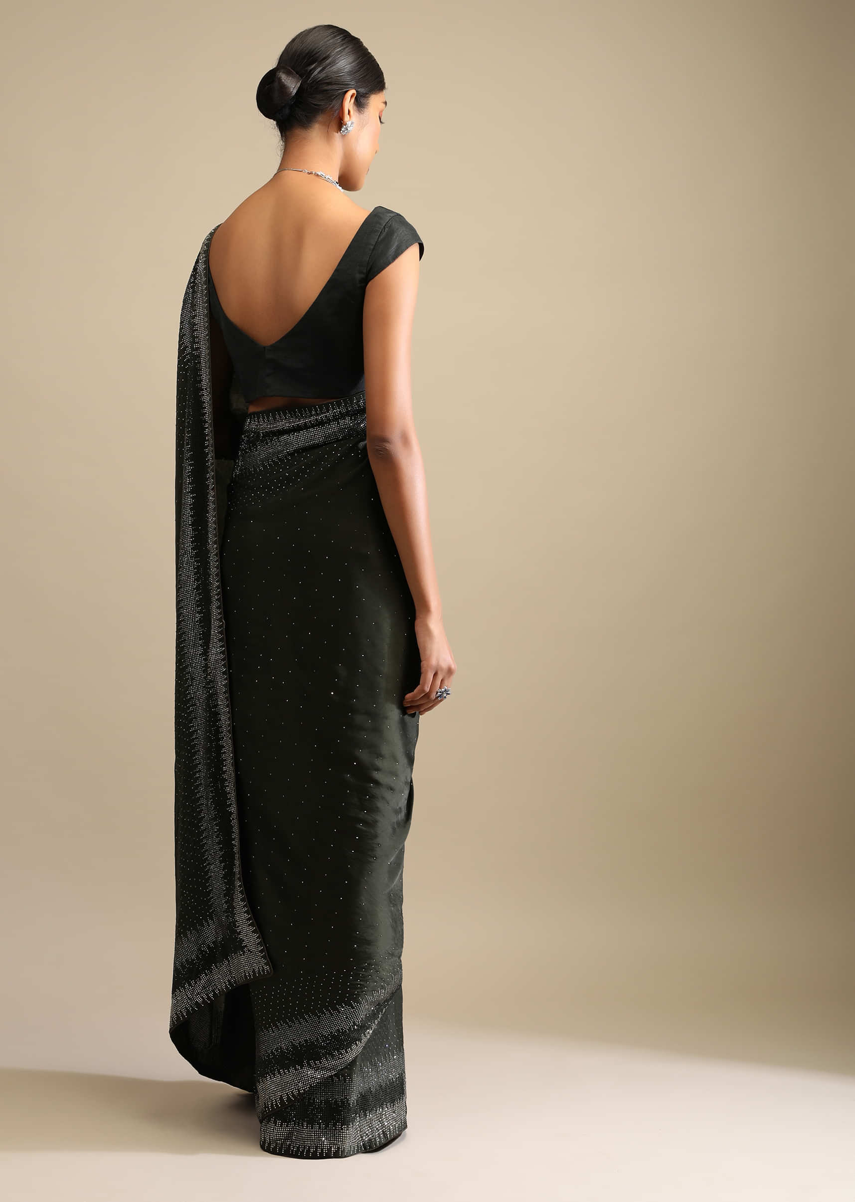 Shadow Green Saree In Satin With Scattered Sequins And Heavy Embellished Border  