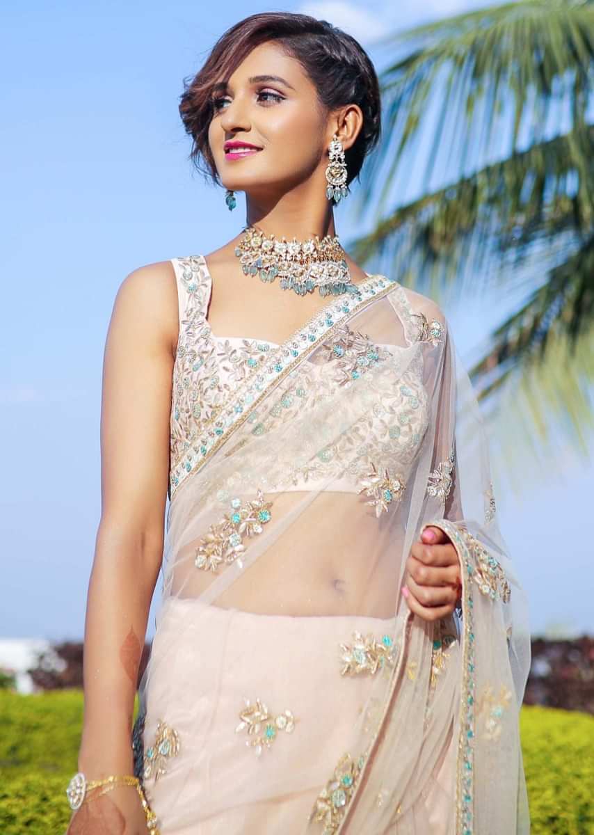 Shakti Mohan in Kalki powder pink net saree with floral embroidered butti 