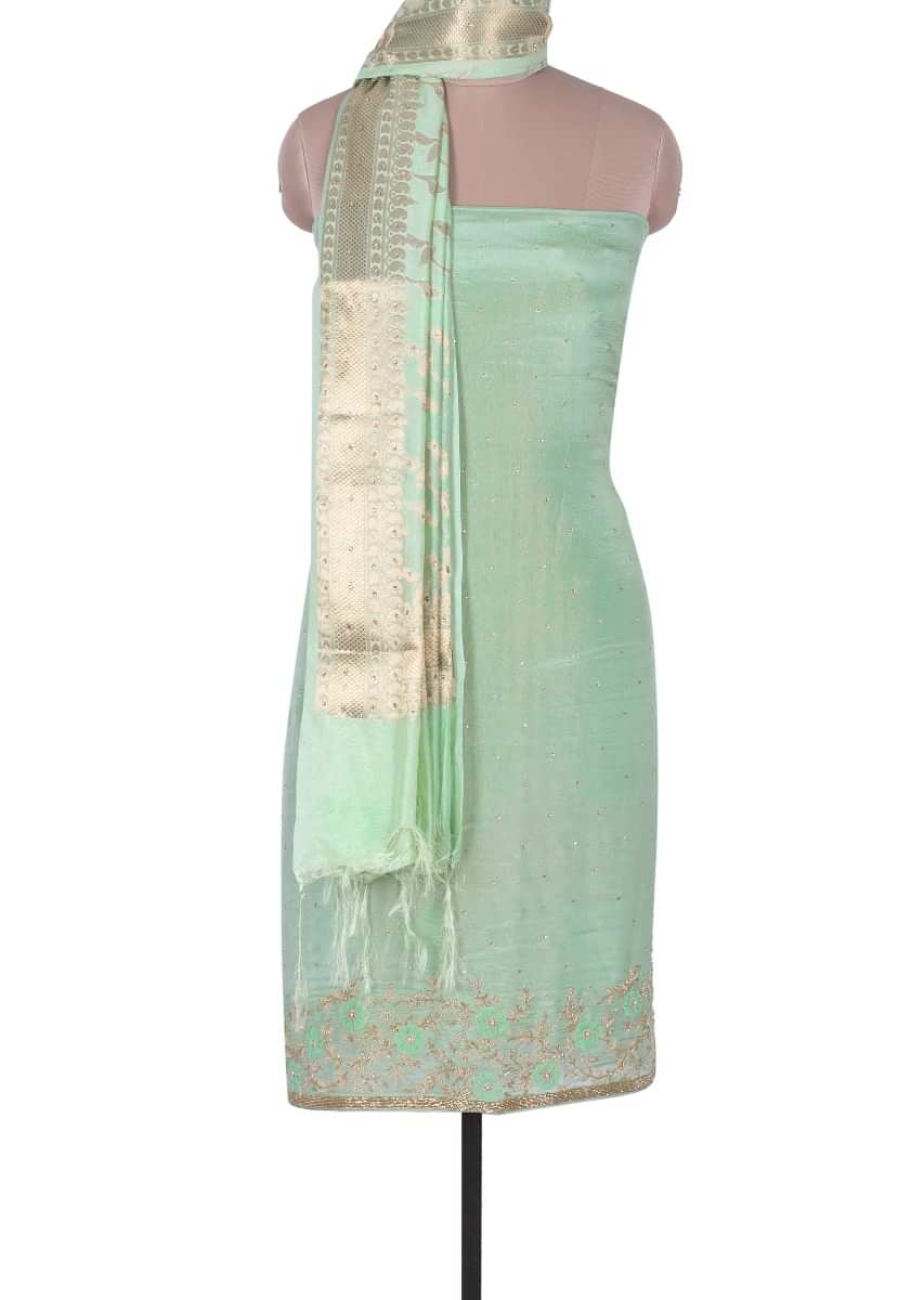 Shimmer chiffon unstitched sea green suit with embroidered butti and border