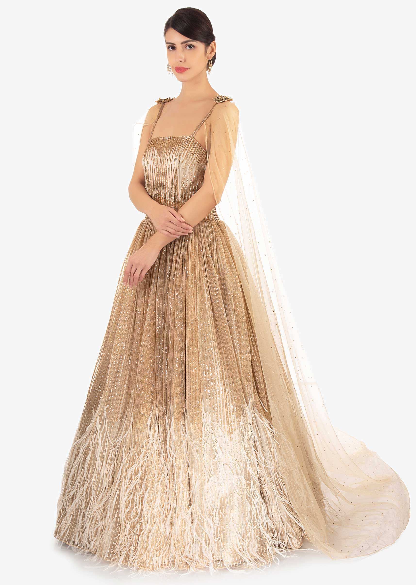 Shimmer sequins  gown in 3 D flowers, feathers and  fancy cape