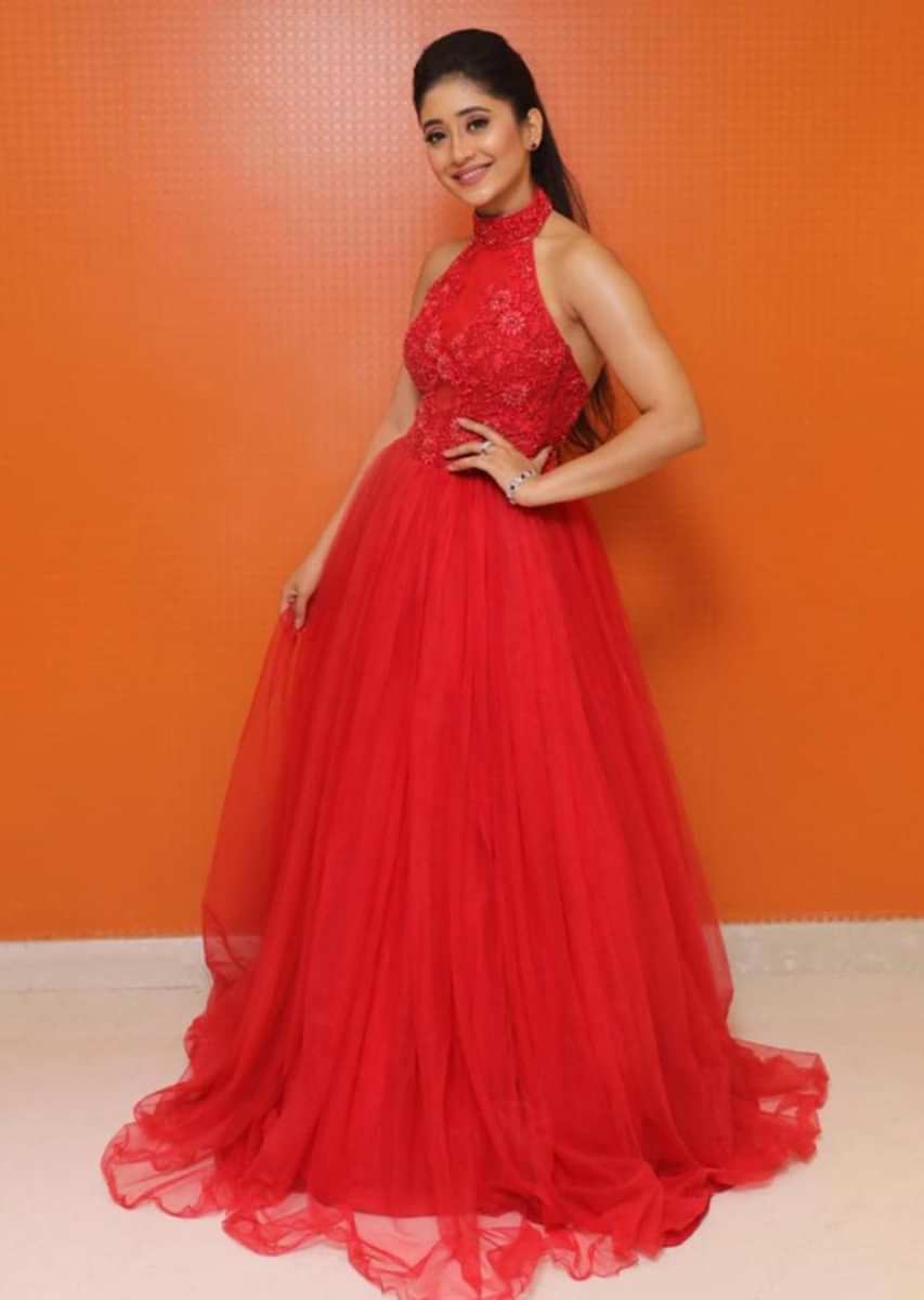 Shivangi Joshi in ruffle candy orange gown actress cape town