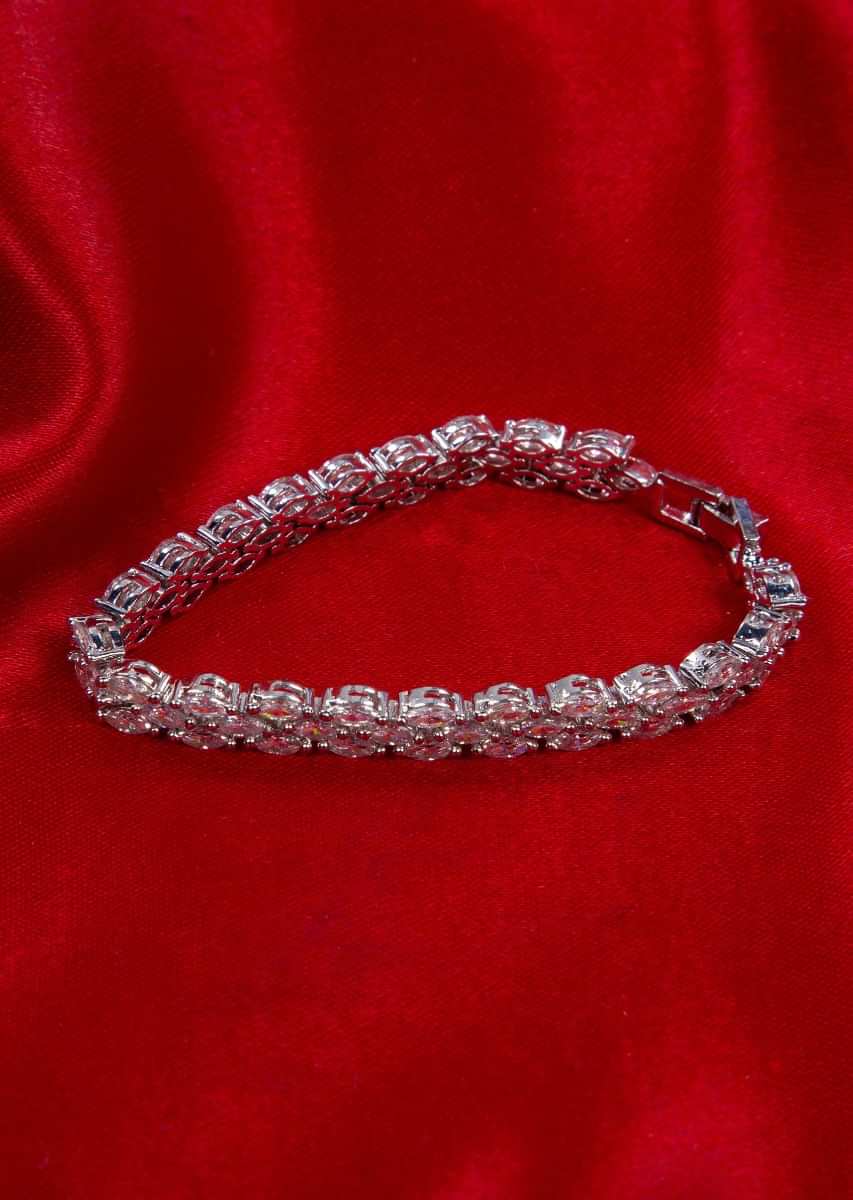 Silver plated triple layer bracelet studded in diamond stones only on kalki