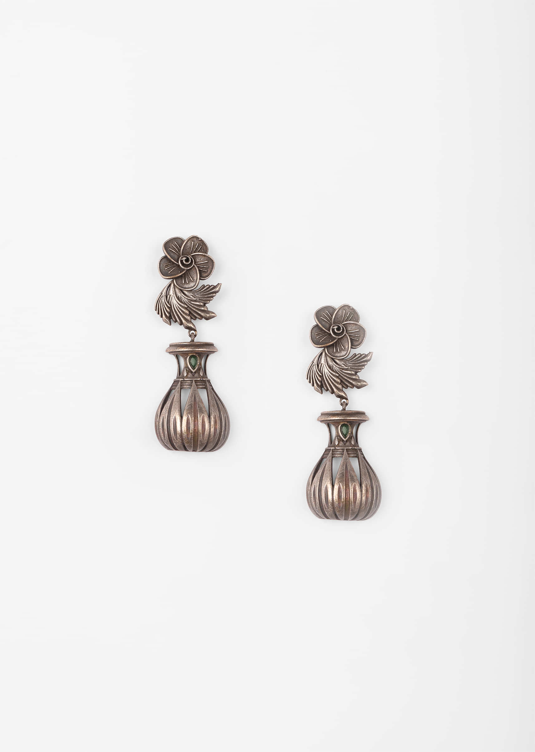 Silver oxidised Earrings With Green Stone And Carved Floral And Vintage Lamp Inspired Design 