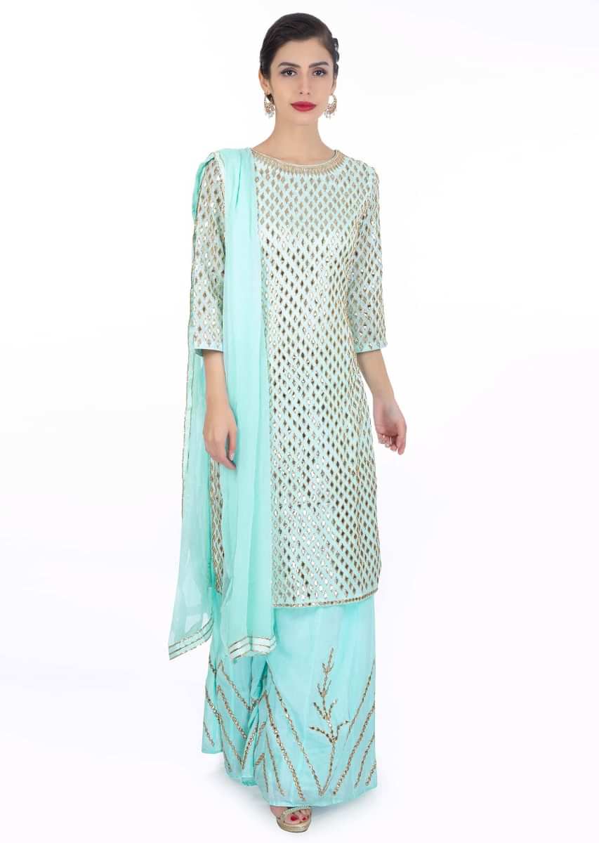 Sky blue cotton suit in gotta patch embroidery paired  with matching cotton palazzo and chiffon dupatta