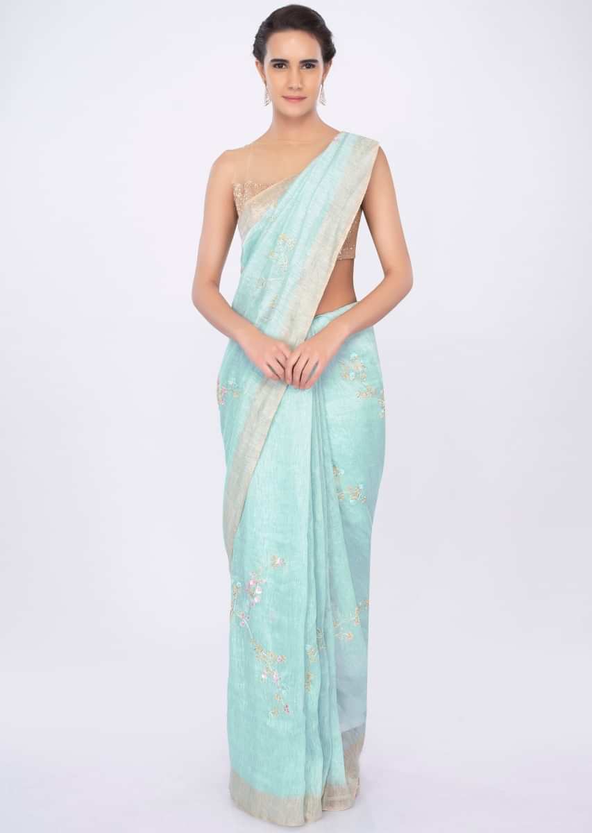 Sky blue linen saree in floral jaal embroidery only on kalki