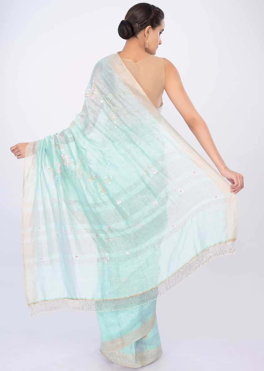 Sky blue linen saree in floral jaal embroidery only on kalki