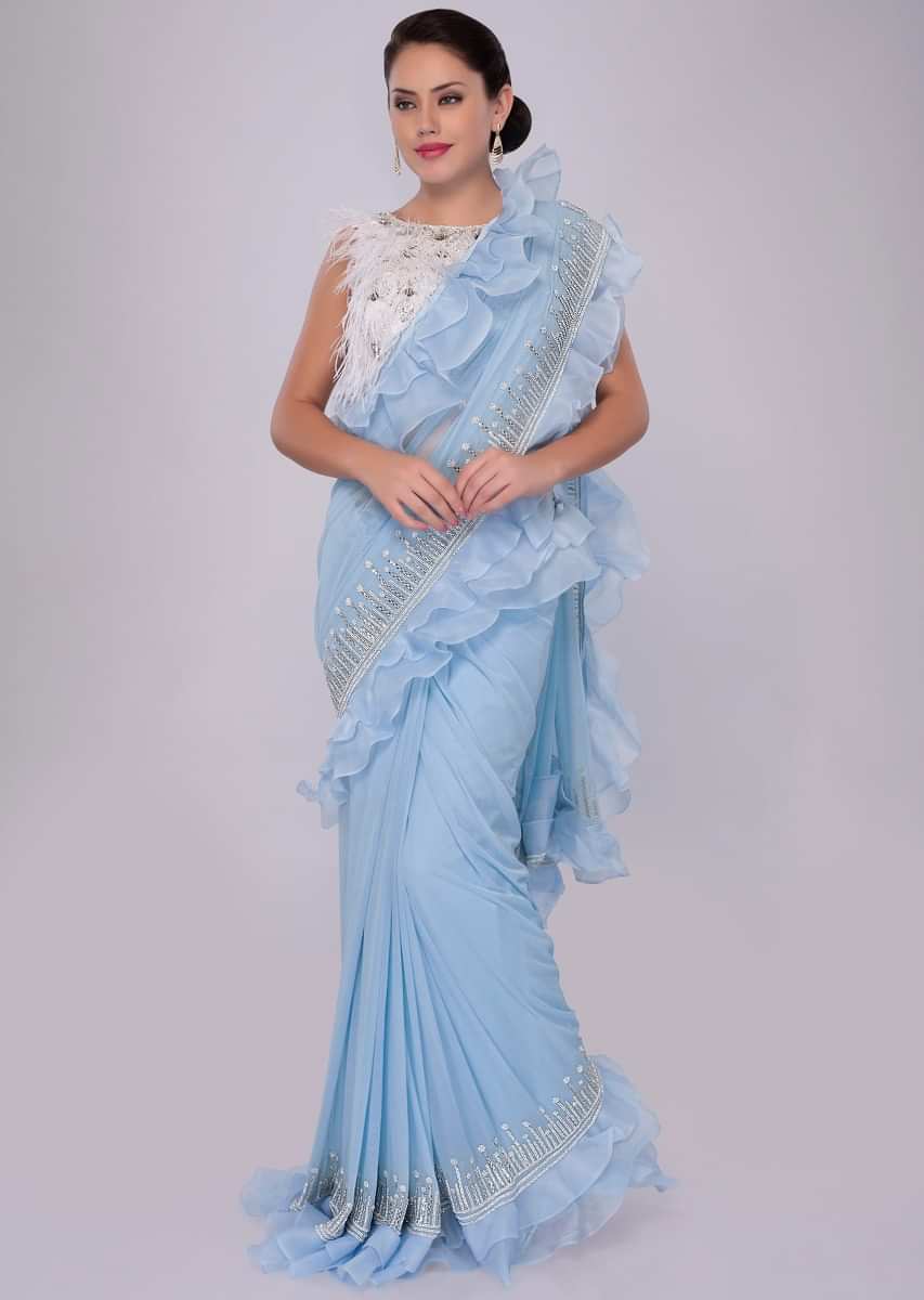 Sky blue lycra saree with ruffled organza border 