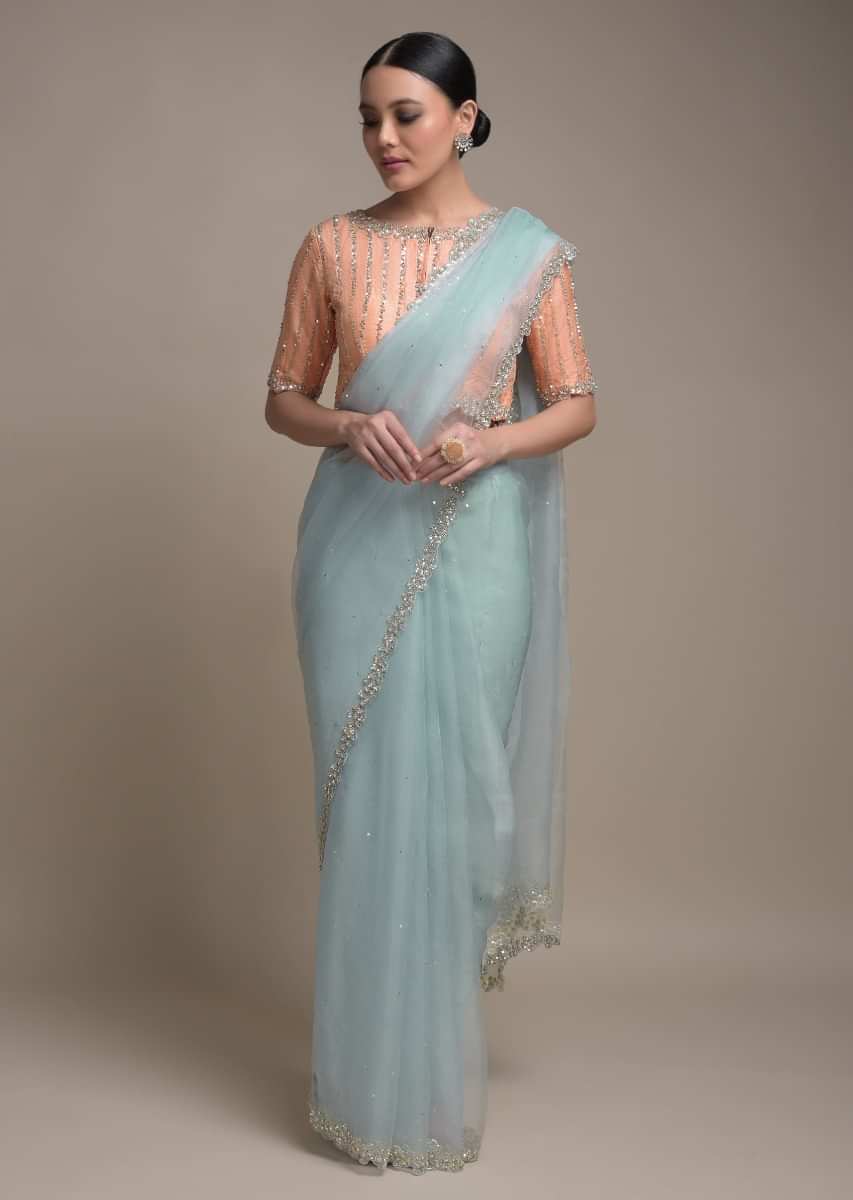 Sky Blue Saree In Organza Adorned With Embellished Floral Pattern On The Border  