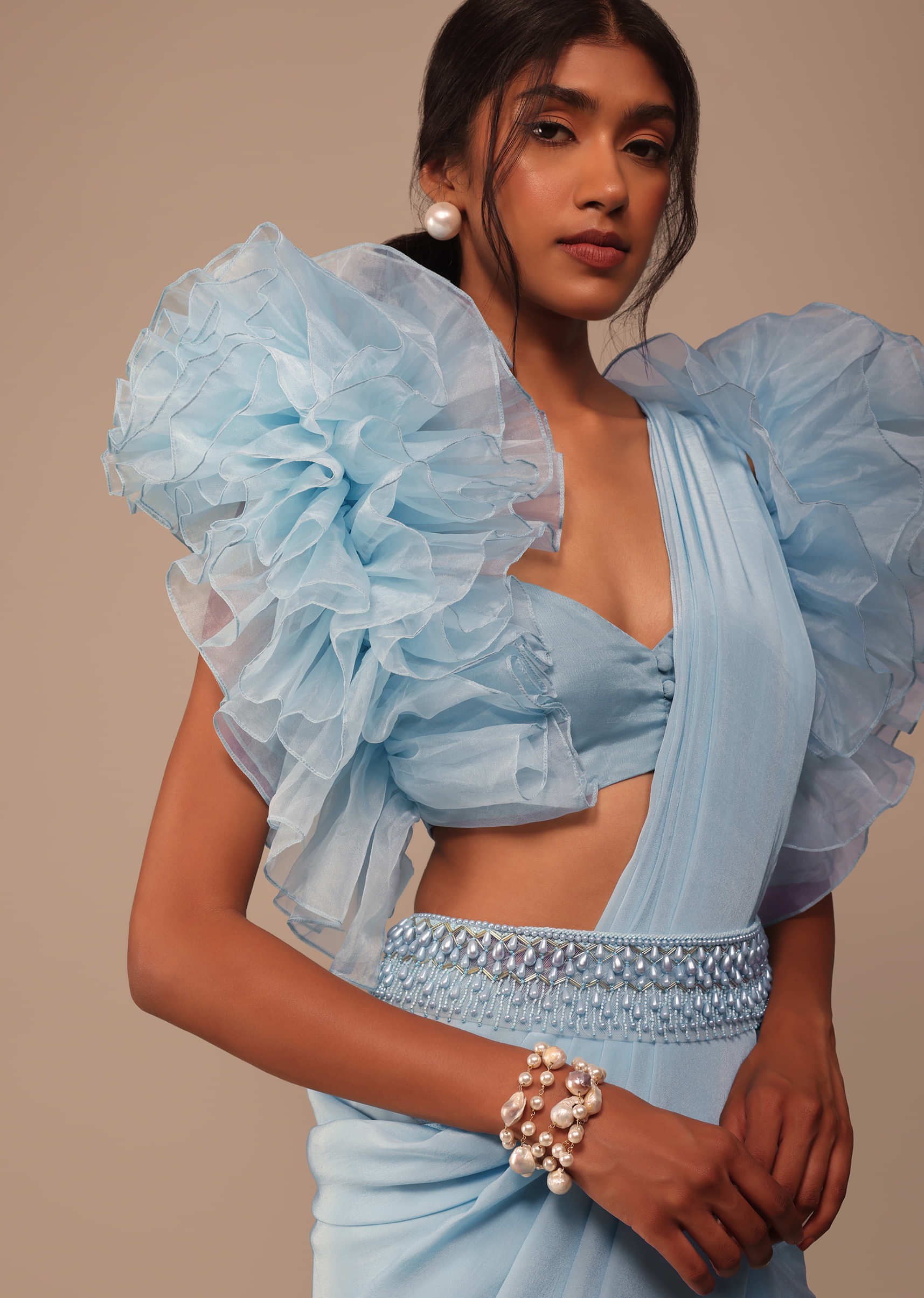Sky Blue Saree With Organza Ruffle Blouse And Embroidered Belt