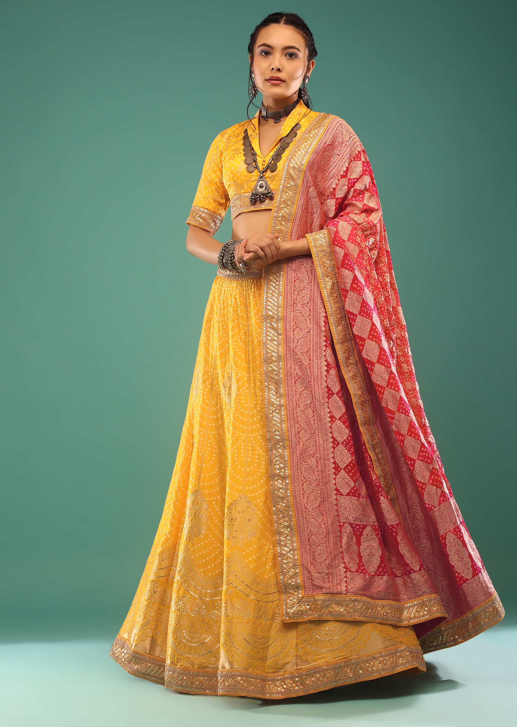 Spectra Yellow Lehenga In Brocade Silk Woven In Bandhani Design, Paired With The Choli And Dupatta With The Sequins,Zari Embroidery