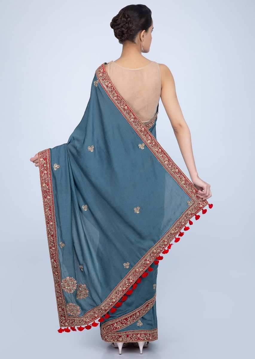 Steel blue cotton silk blue saree with embroidered butti and border only on Kalki
