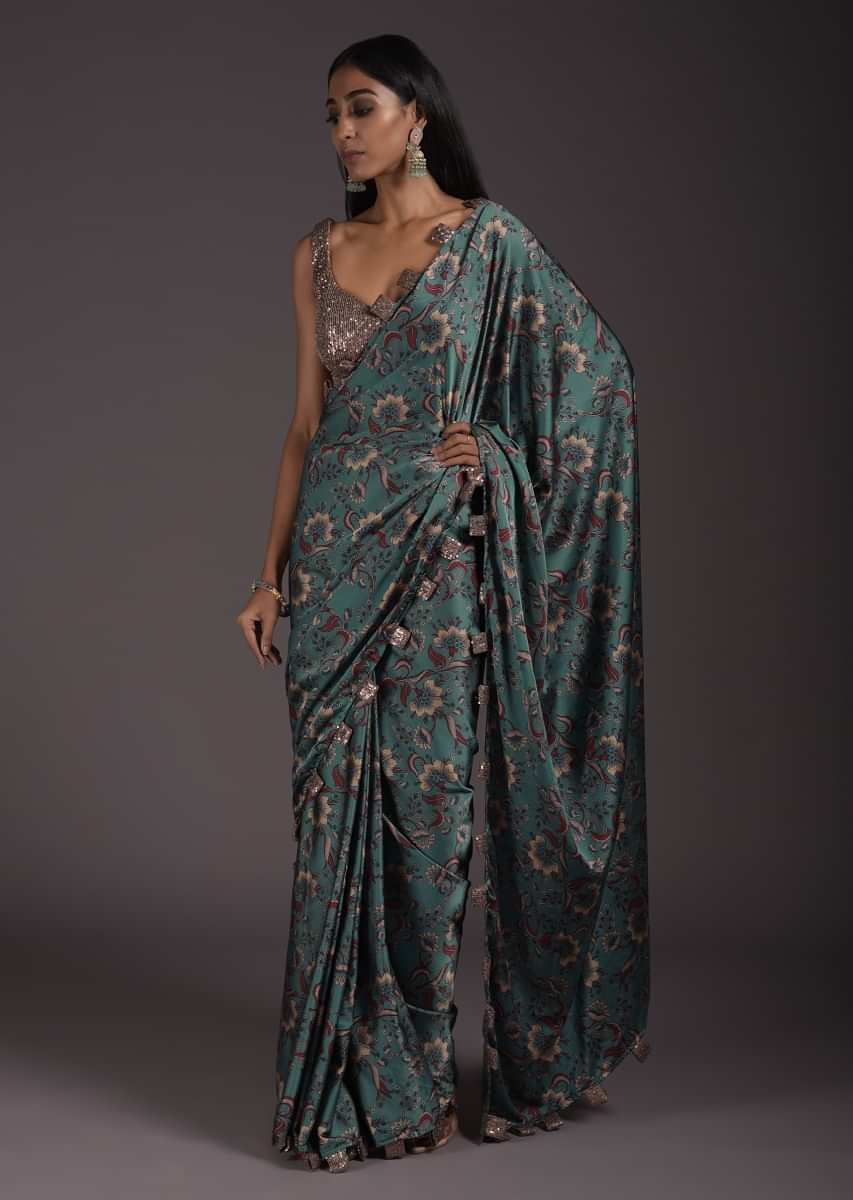 Steel Blue Floral Printed Saree In Satin With Sequin Tassels On The Border And Sequins Blouse With Cut Out Details  