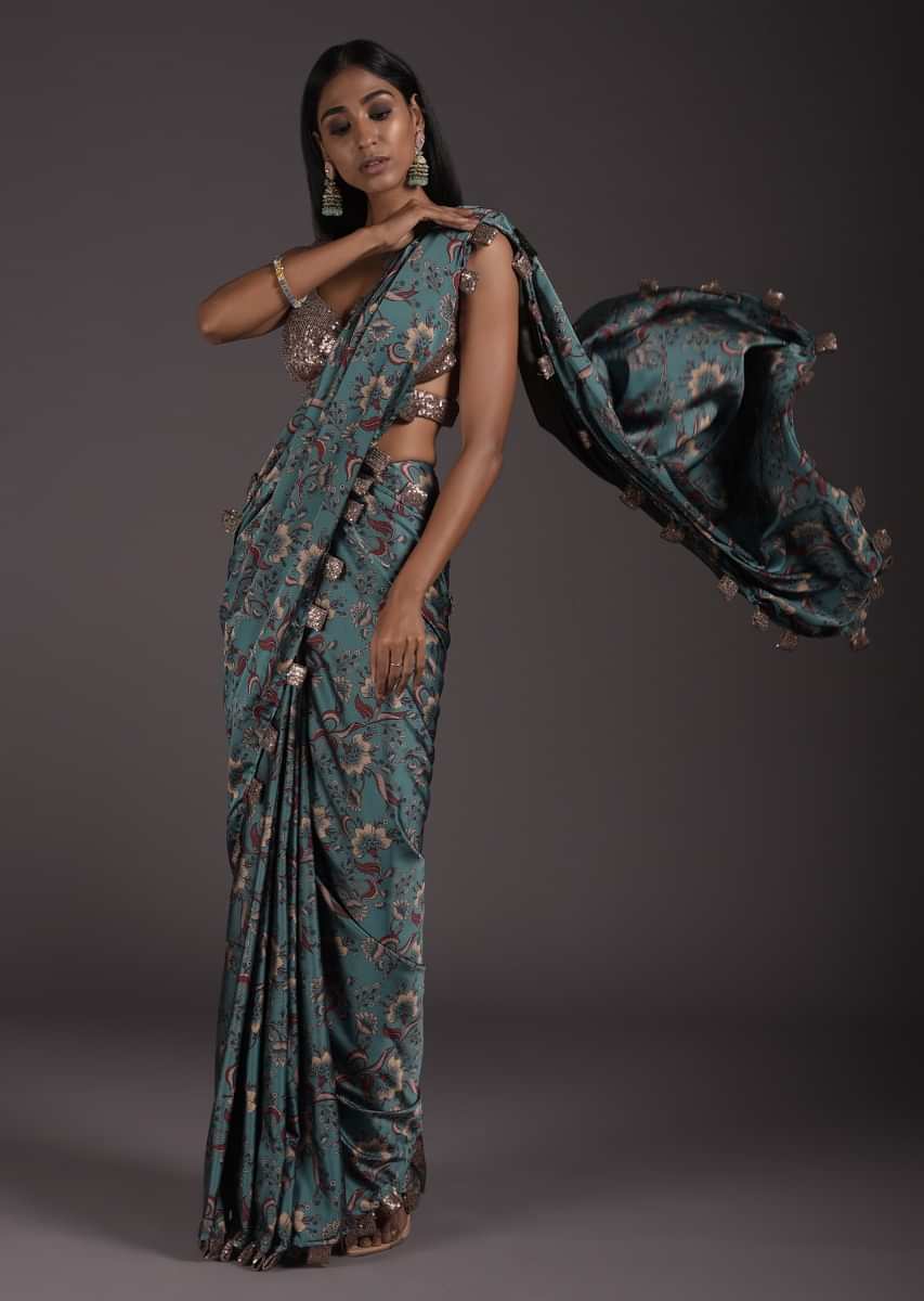 Steel Blue Floral Printed Saree In Satin With Sequin Tassels On The Border And Sequins Blouse With Cut Out Details  