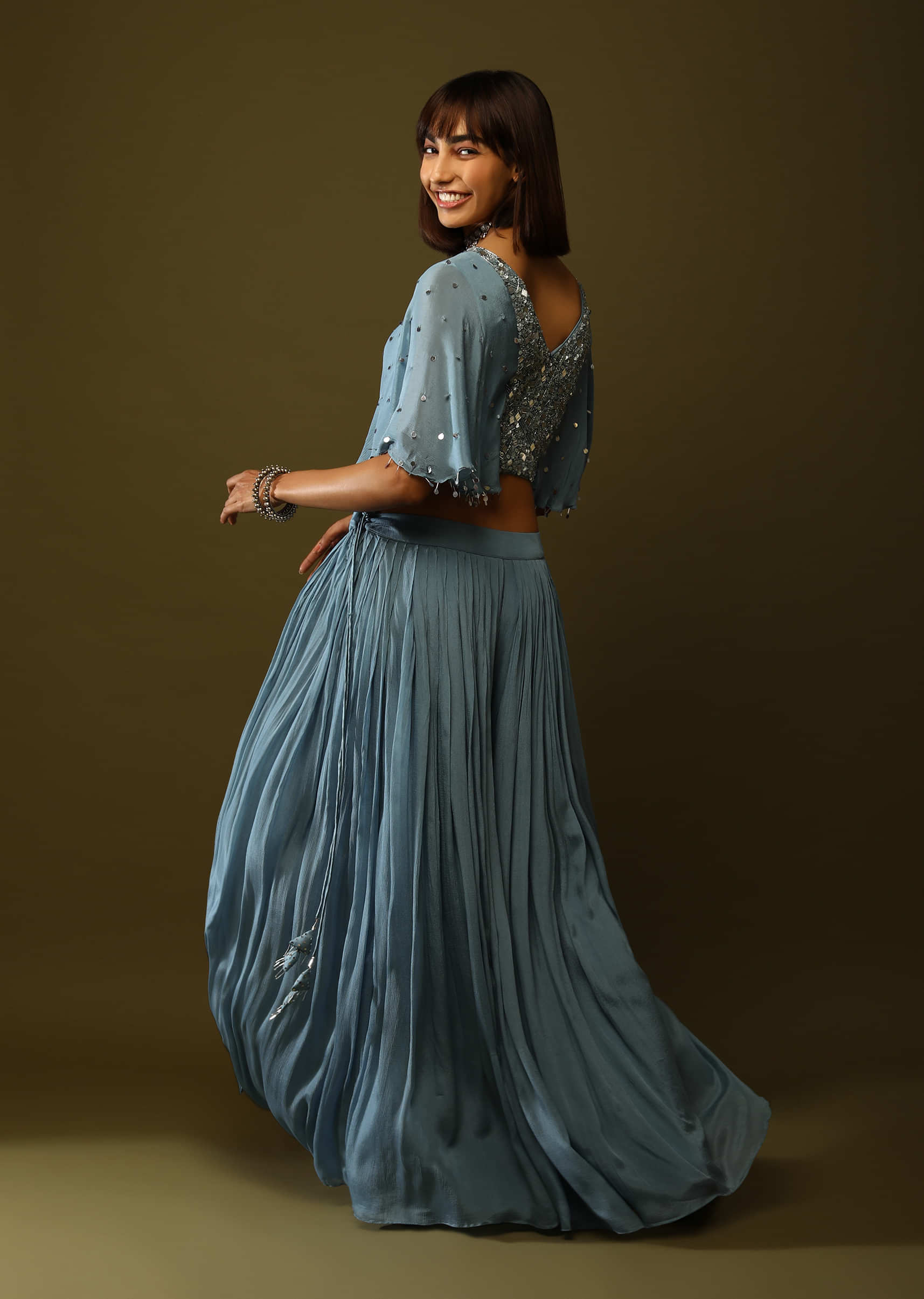 Steel Blue Palazzo And Crop Top Suit With Cut Dana And Sequins Embroidery And Cape Sleeves  