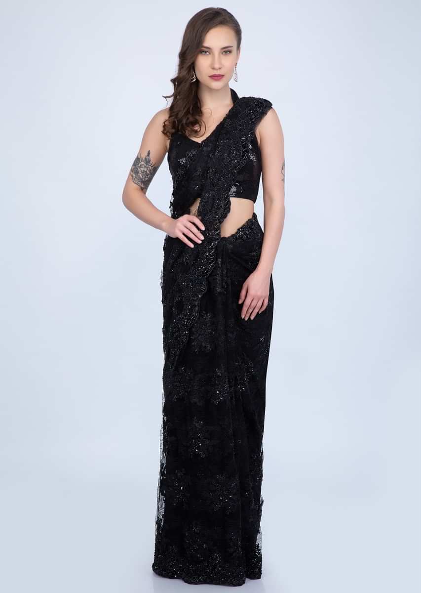 Stunning Black chantilly lace saree embellished with sequins, cut dana and pearls only on Kalki