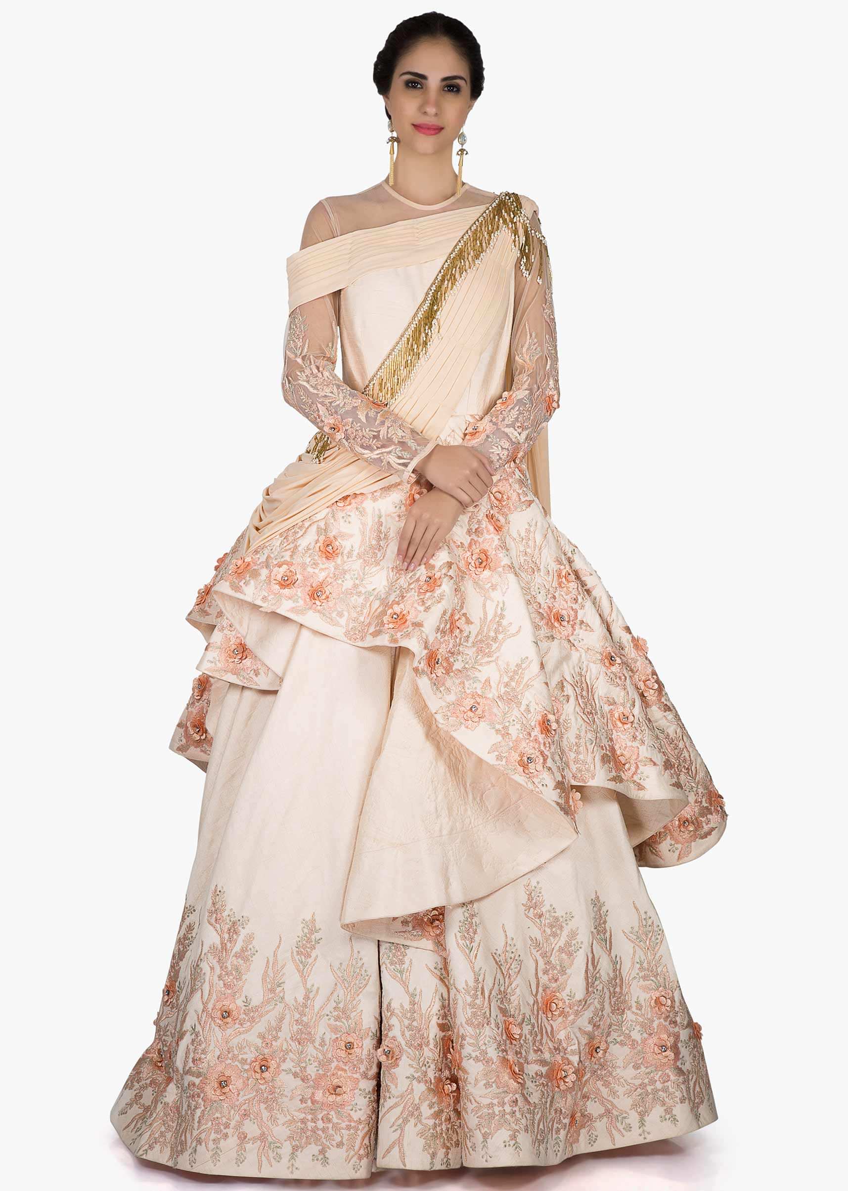 Stunning gown in cream pink with stunning embroidery in pearls and beautiful drape only on Kalki