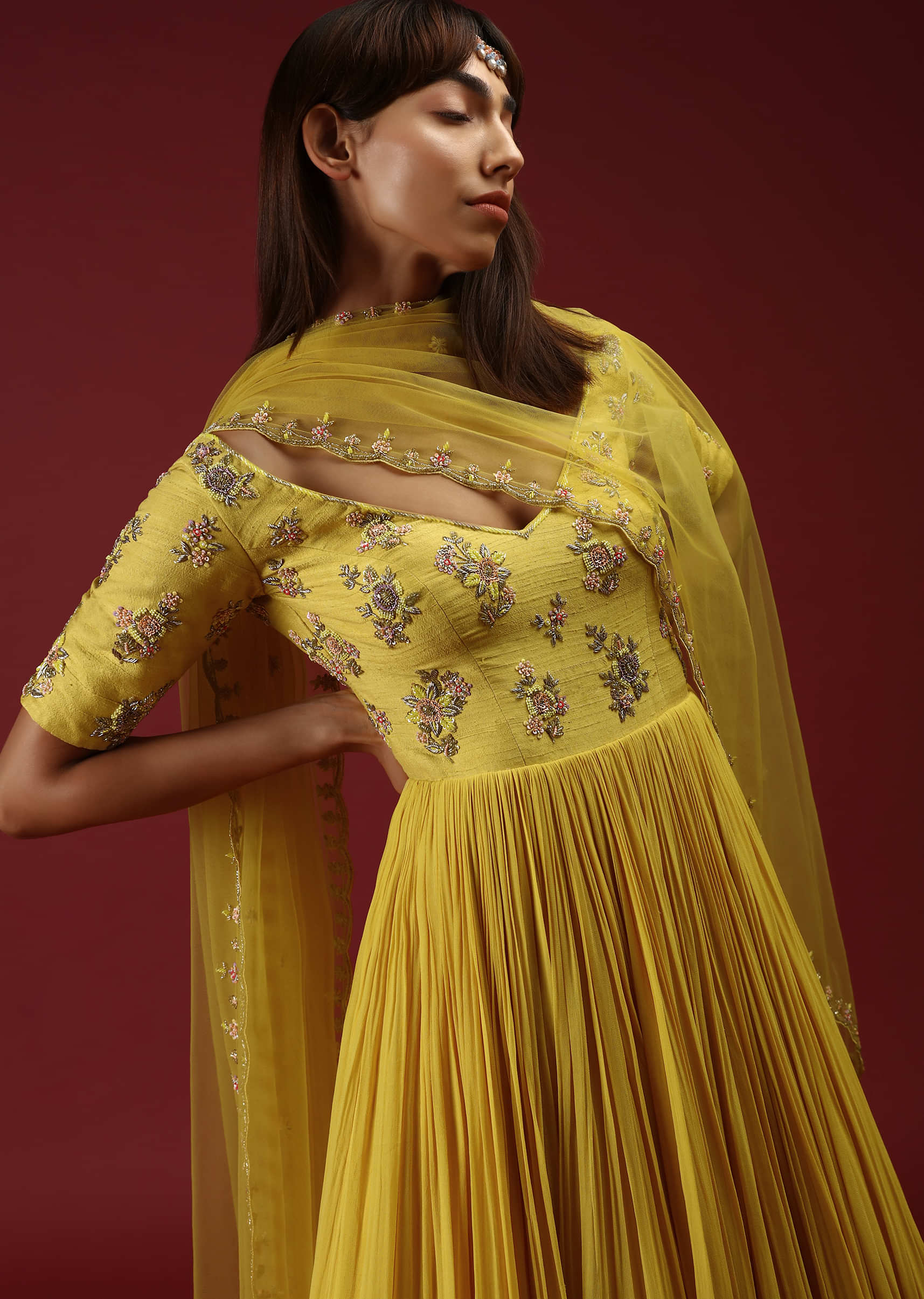 Sun Yellow Anarkali With A Deep V Neckline And Multi Colored Sequins And Beads Embroidered Buttis  