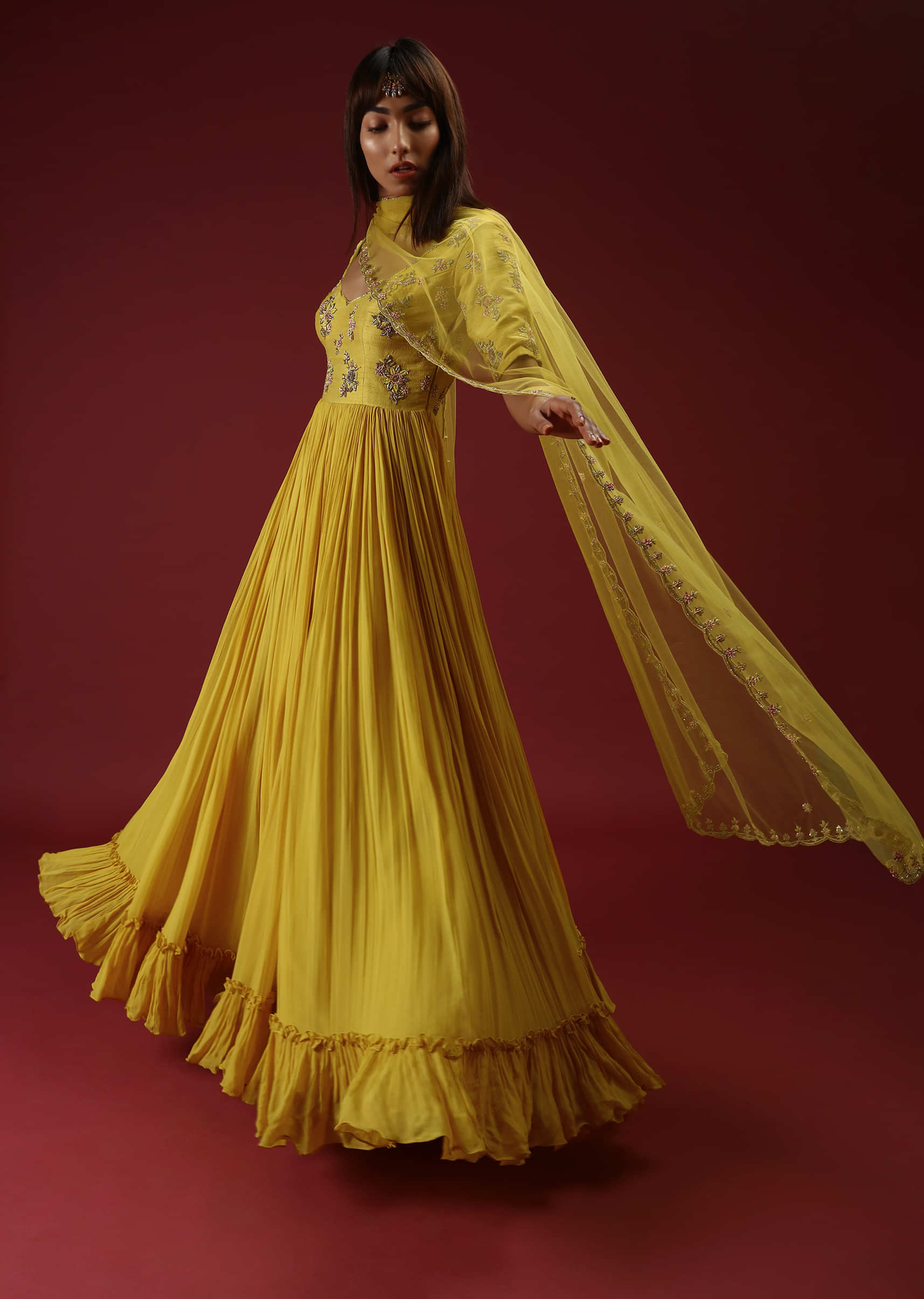 Sun Yellow Anarkali With A Deep V Neckline And Multi Colored Sequins And Beads Embroidered Buttis  