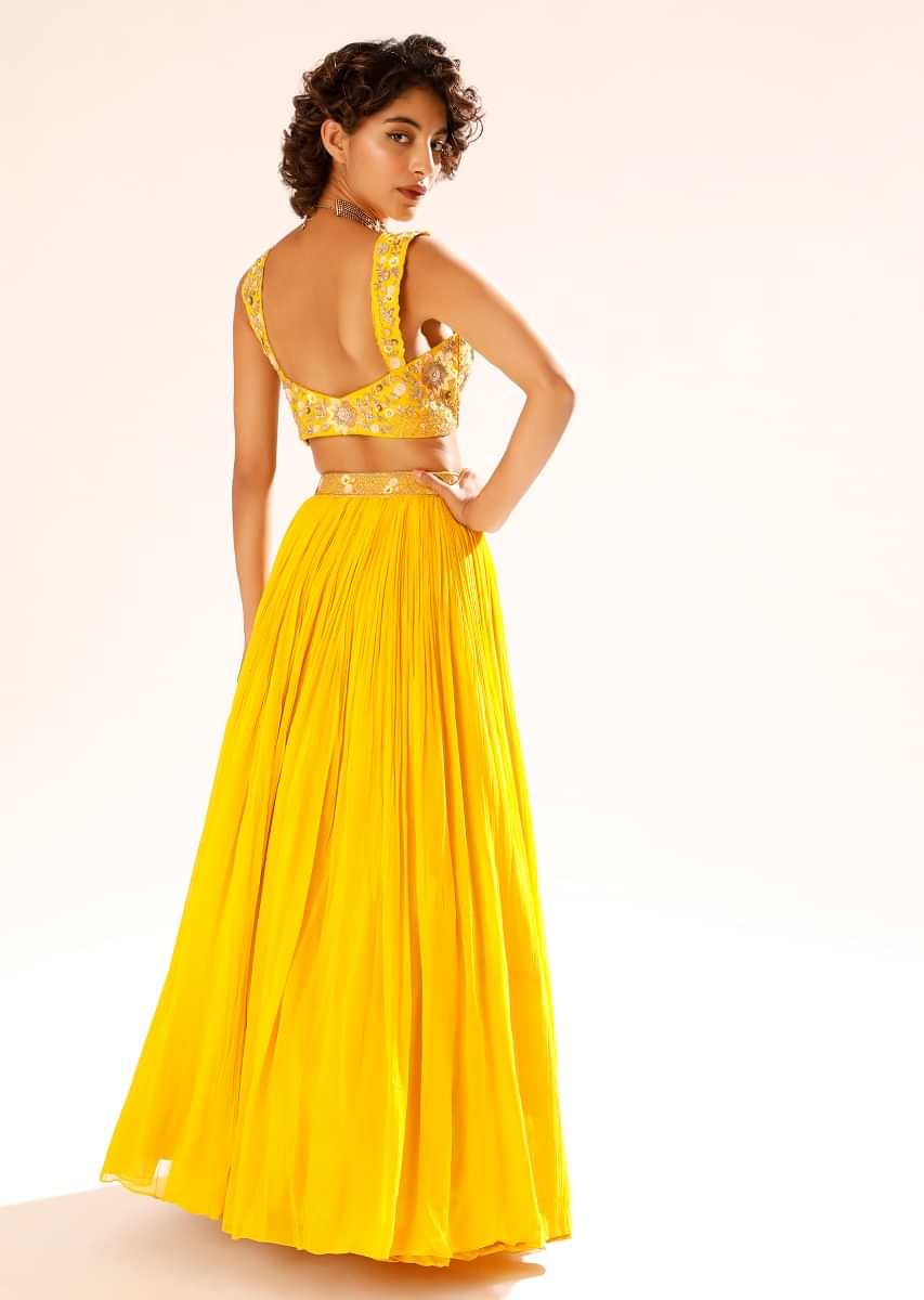 Sun Yellow Gathered Lehenga With Hand Embroidered Blouse Using Sequins And Cut Dana In Floral Motifs 