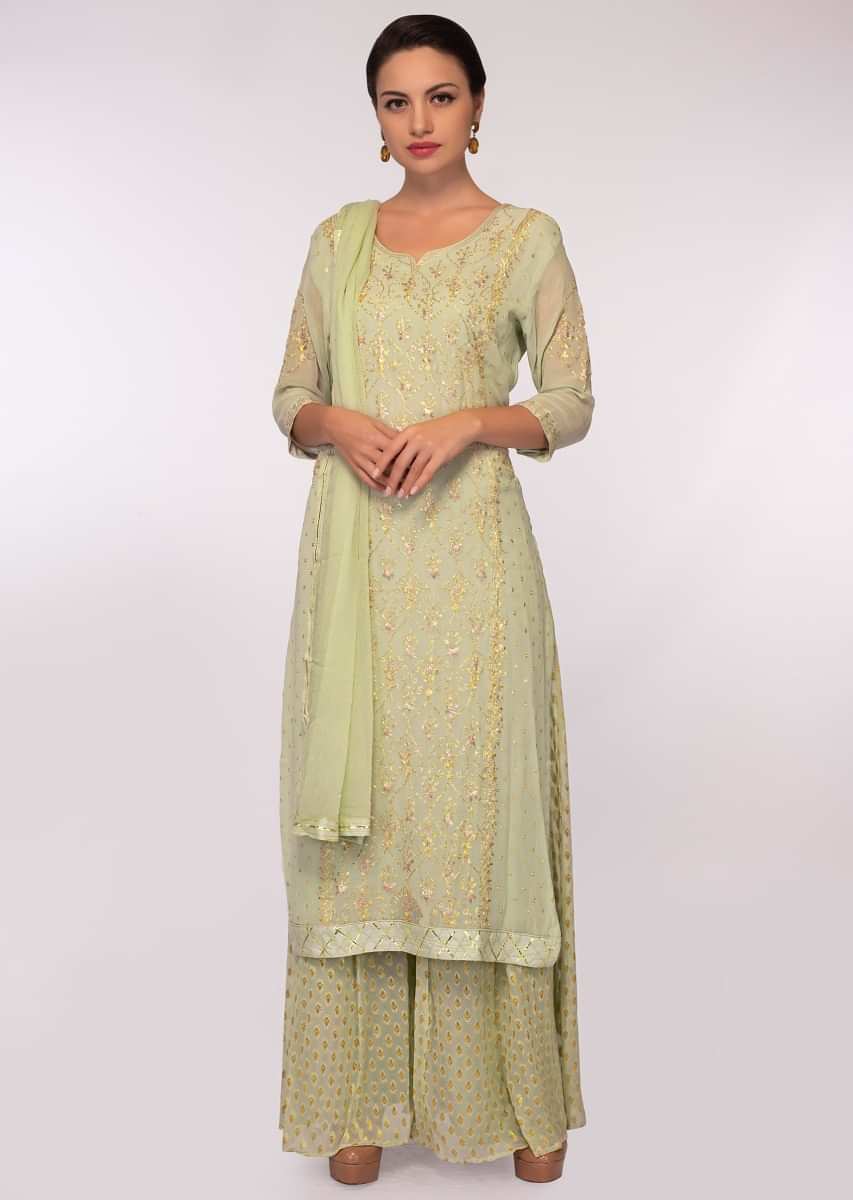 Tea green georgette suit in zari floral embroidery and butti 