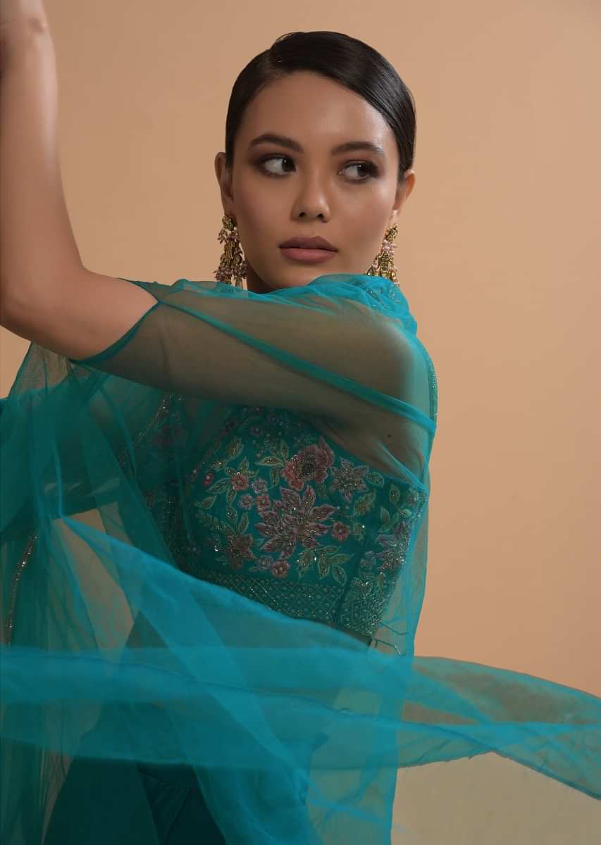 Teal Drape Skirt And Crop Top With Matching Cape And Colorful Resham Embroidered Spring Blooms  
