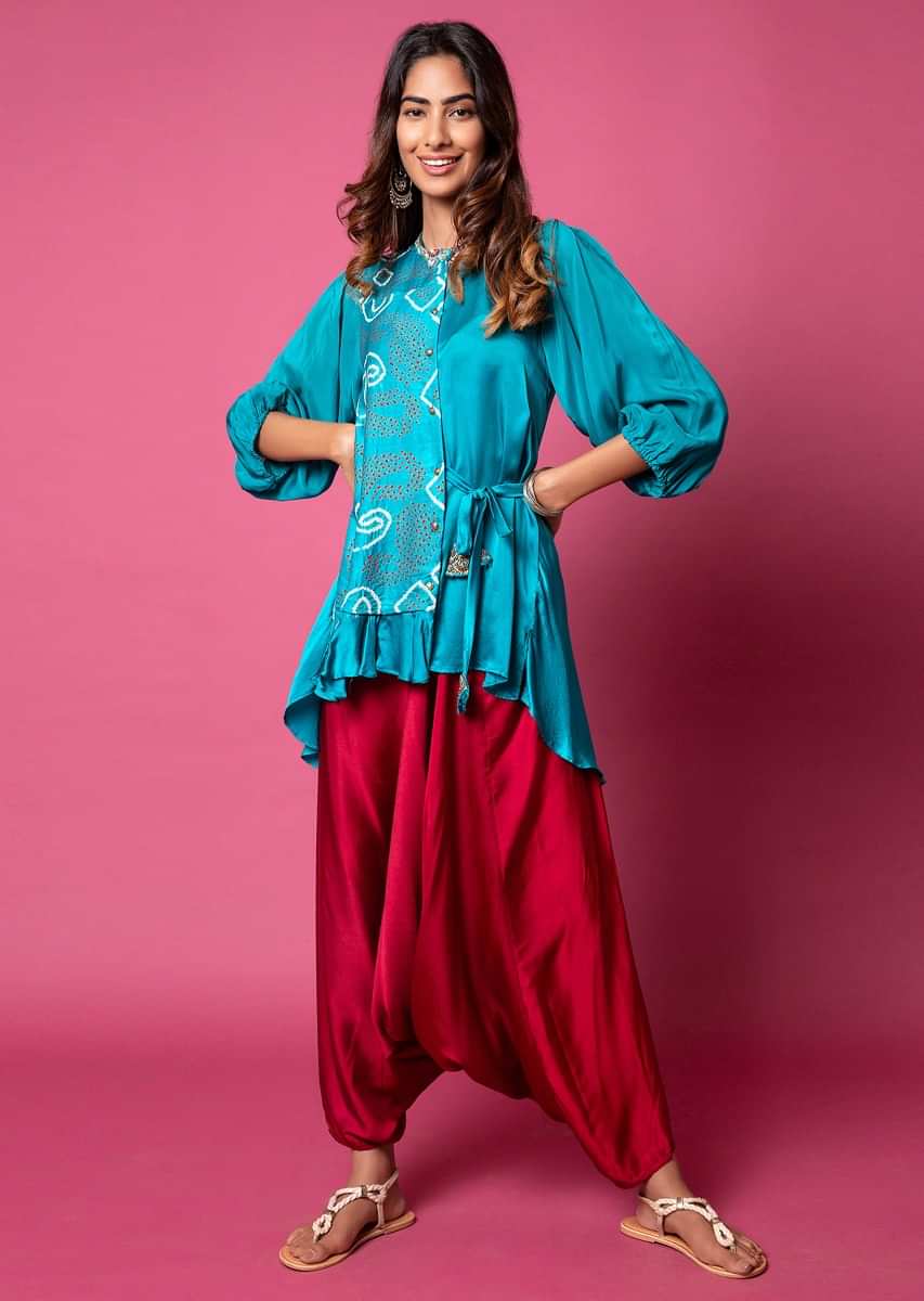 Teal Frill Shirt With Bandhani Printed Paisley Motifs, Puff Sleeves And Paired With Scarlet Red Cowl Pants  
