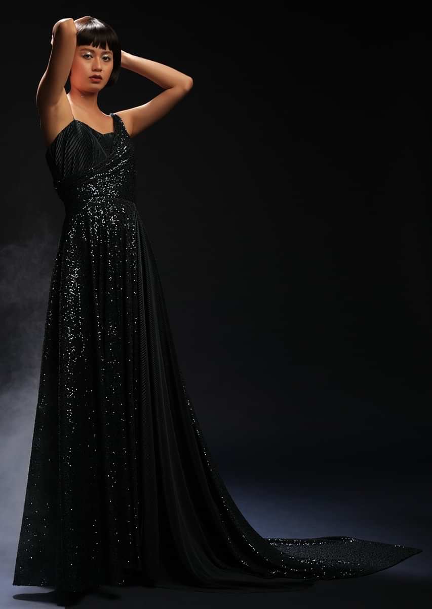 Teal Gown Embellished In Sequins With Drape Design On The Bodice And Extended Cape On One Shoulder