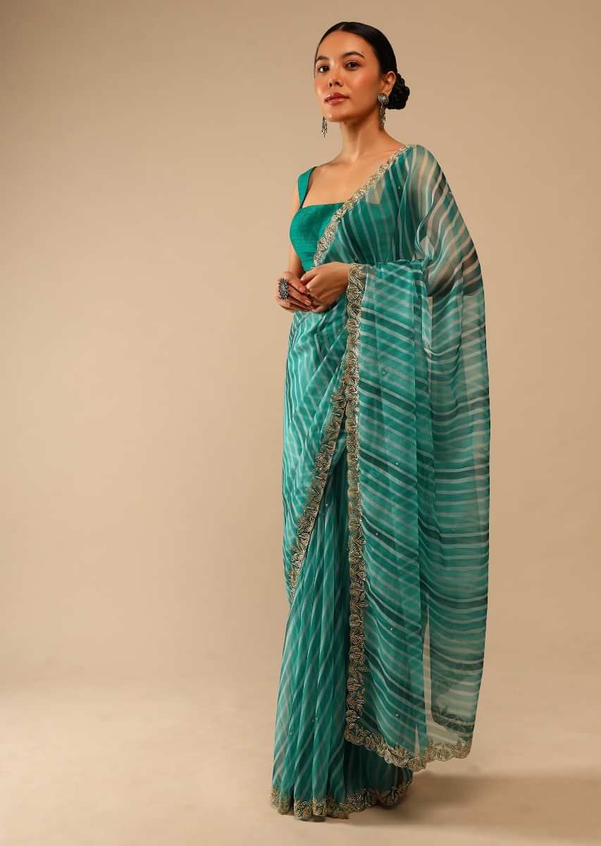Teal Green Saree In Organza With Lehariya Print And Hand Embroidered Border With Beads And Sequins Work  