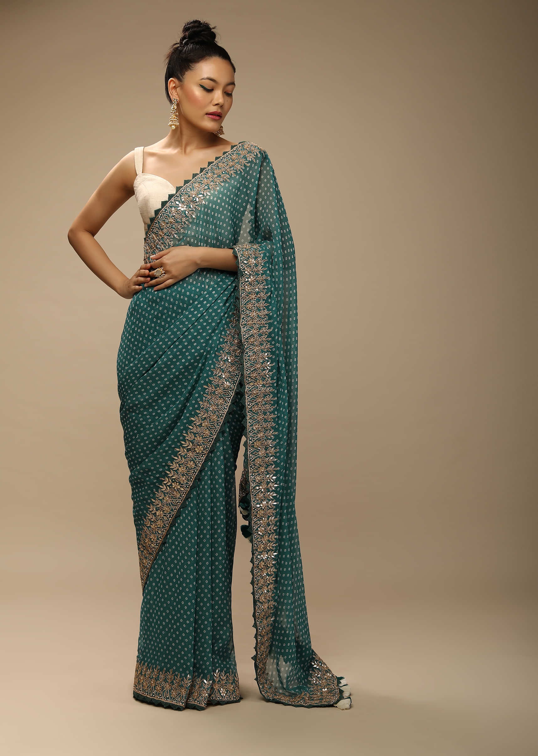 Teal Green Bandhani Saree In Georgette With Gotta Patti Embroidered Floral Border