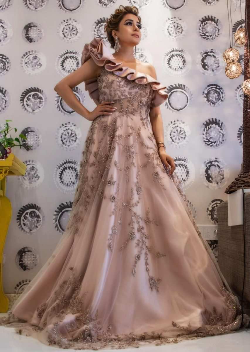 Tina Datta in Kalki Rose Pink One Shoulder Net and Satin Gown Styled with Ruffles and Handwork 