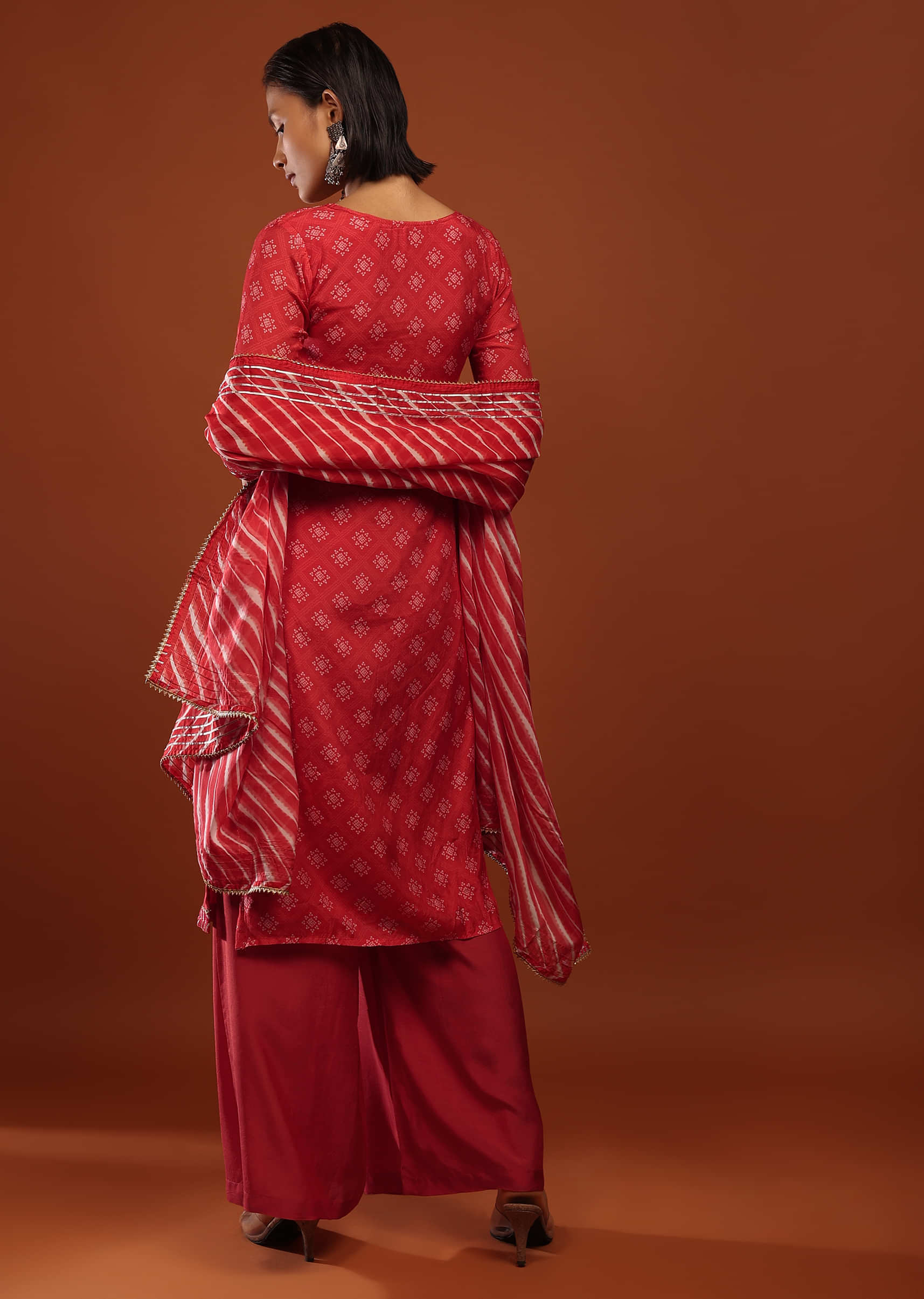 Fiery Red Straight Cut Palazzo Suit With Bandhani Print And Gotta Patti Embrodiered Yoke Design