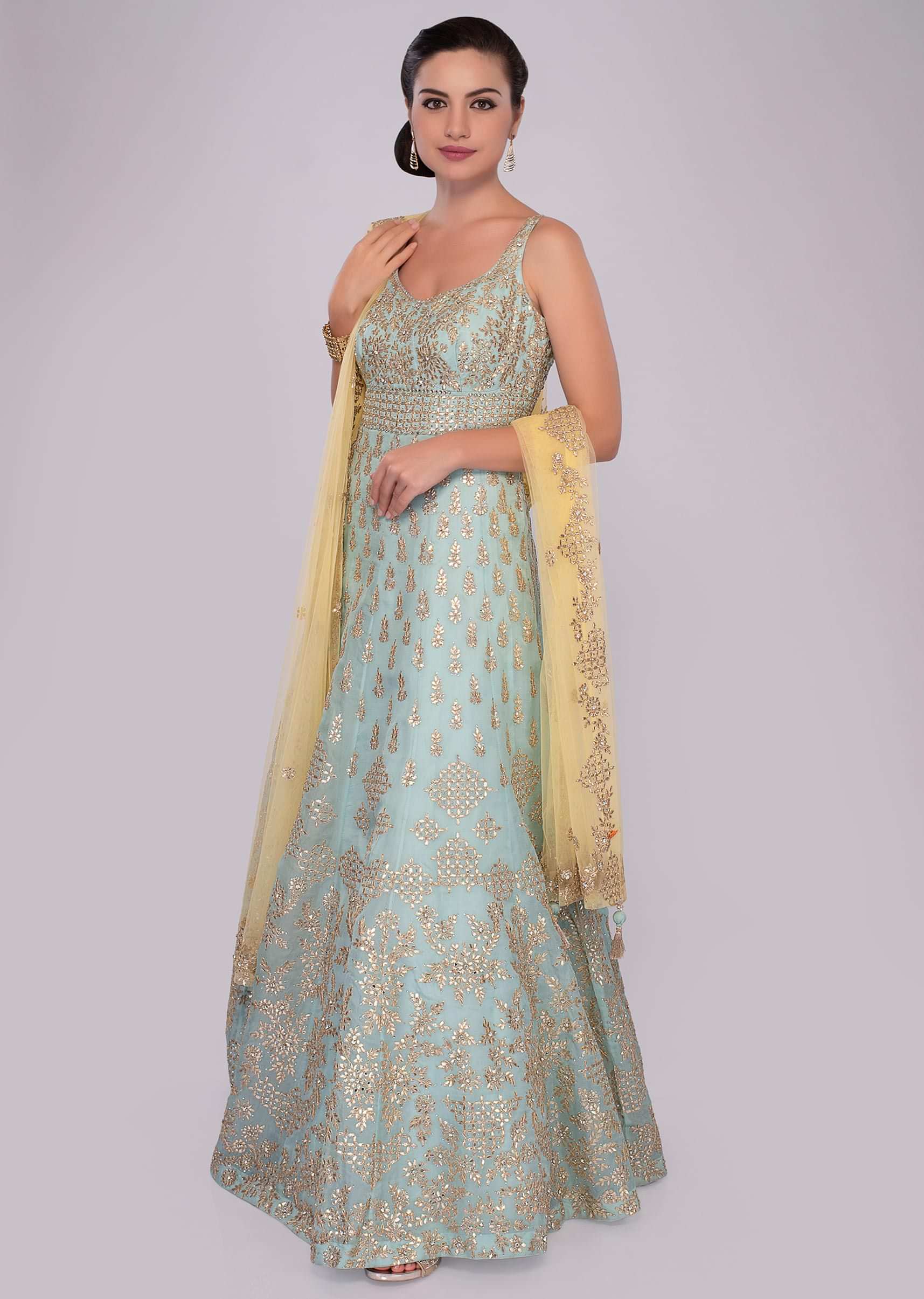 Turq blue anarkali gown in floral embroidery and butti