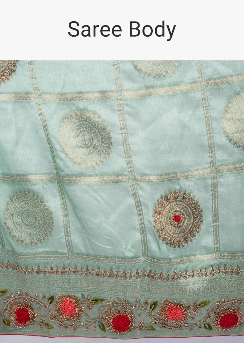 Turq blue banarasi brocade saree in checks and floral motif only on kalki