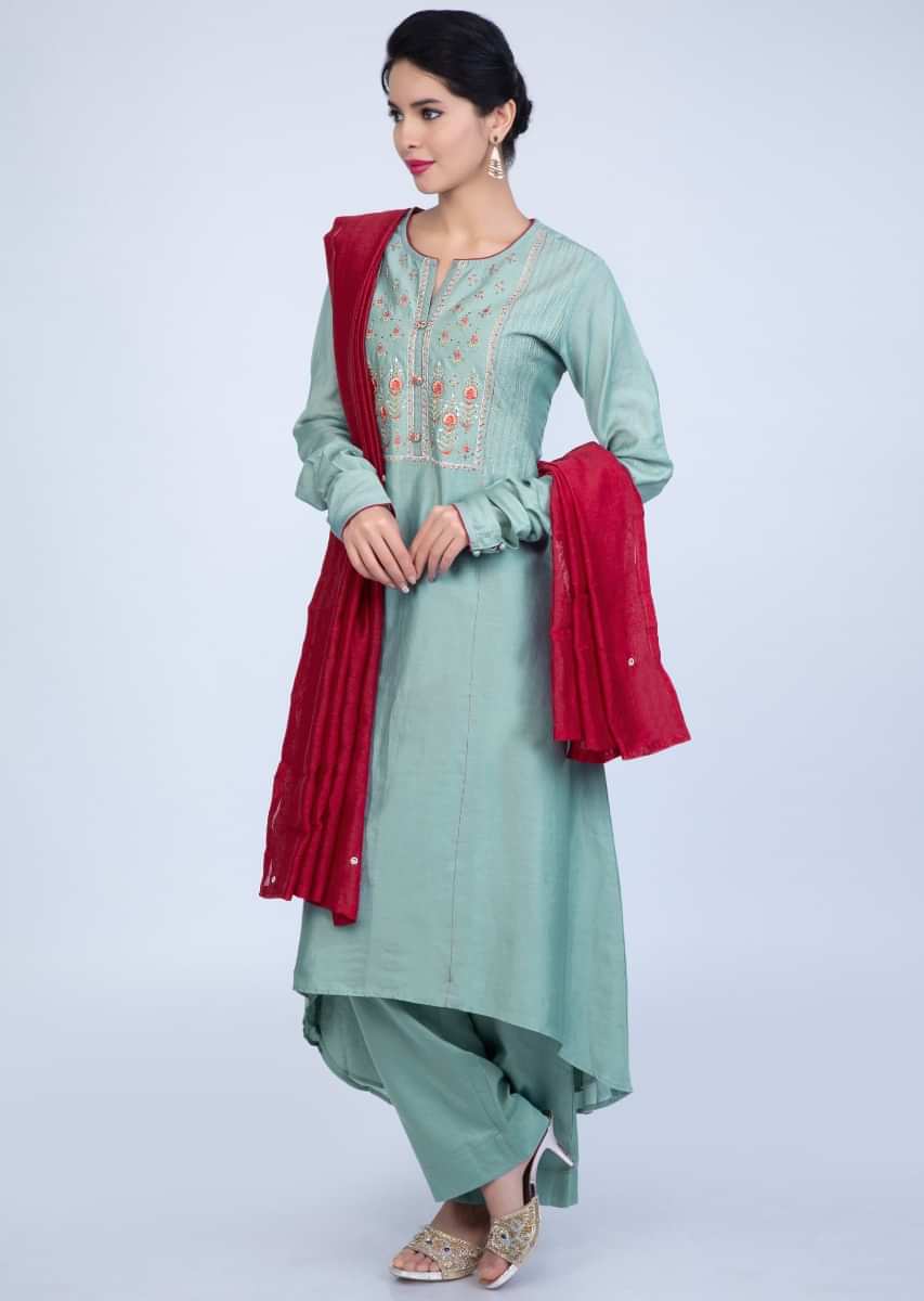 Turq Blue Suit With Embroidery Work Teamed With Matching Pant And Contrasting Red Dupatta Online - Kalki Fashion
