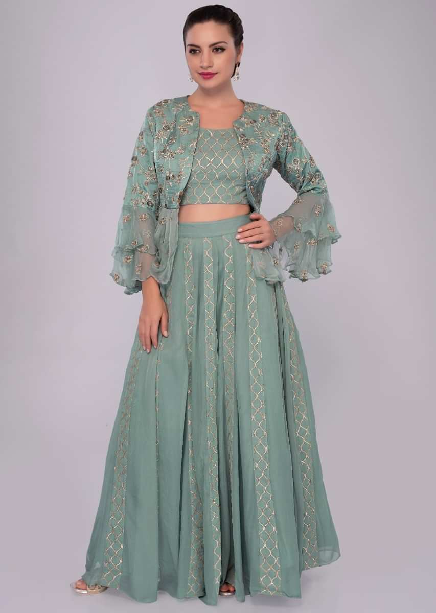 Turq blue lehenga set paired with fancy jacket with frills and gathers
