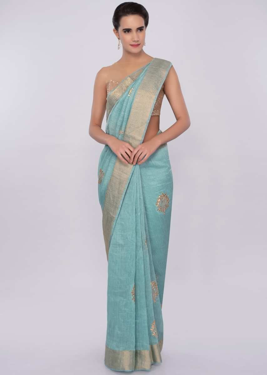 Turq blue linen saree with gotta patch butti only on Kalki