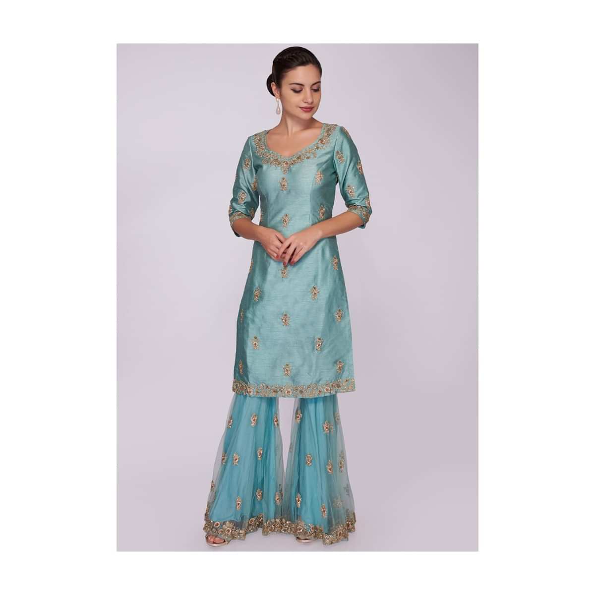 Turq blue raw silk sharara suit adorn in floral zari embroidery only on Kalki