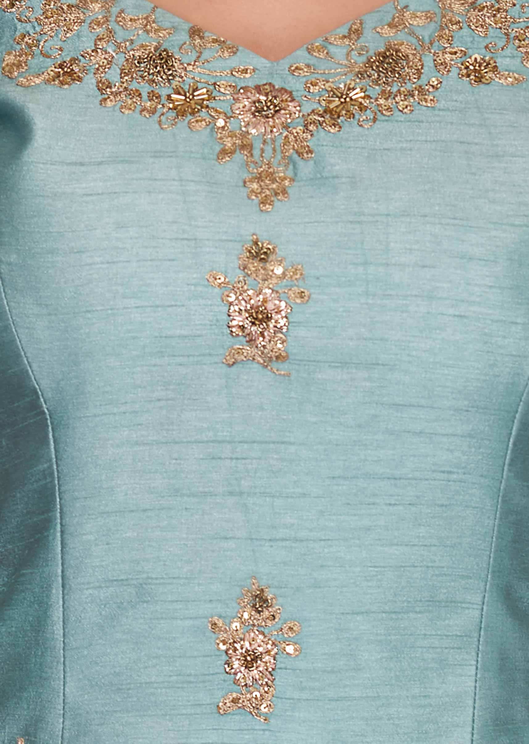 Turq blue raw silk sharara suit adorn in floral zari embroidery