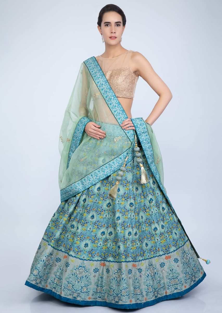Turq Blue Lehenga In Shaded Cotton Silk With Patola Print And Green Organza Dupatta Online - Kalki Fashion
